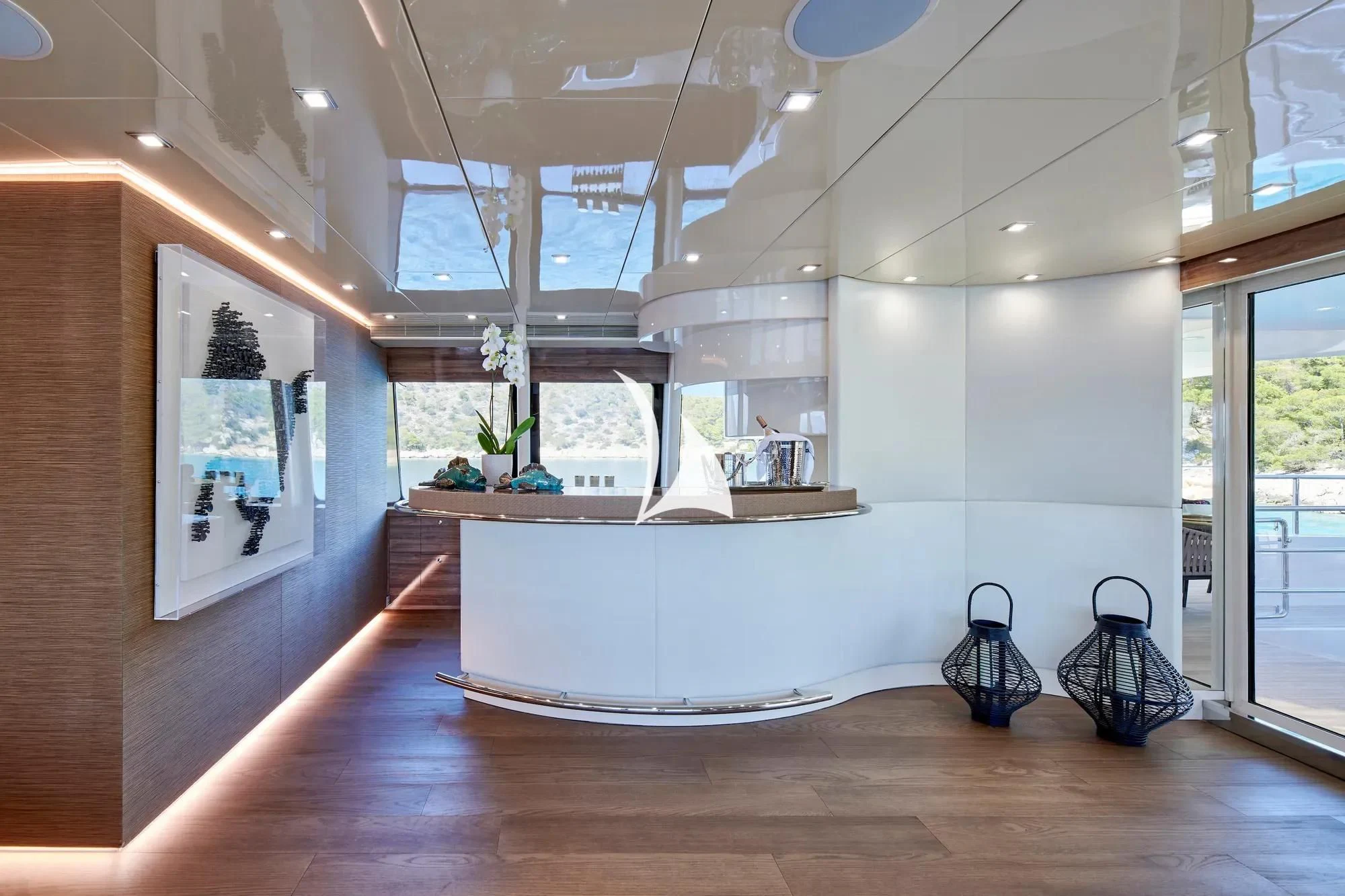 a room with a large white wall aboard PROMETHEUS I Yacht for Charter