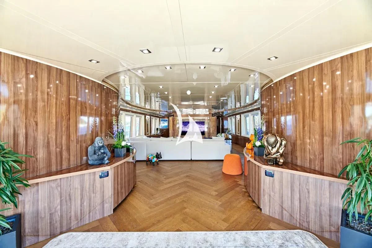a room with wood walls and a wood floor aboard PROMETHEUS I Yacht for Charter