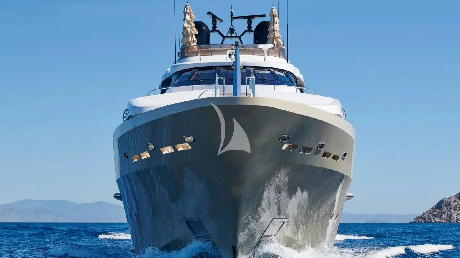 a large ship in the water aboard PROMETHEUS I Yacht for Charter