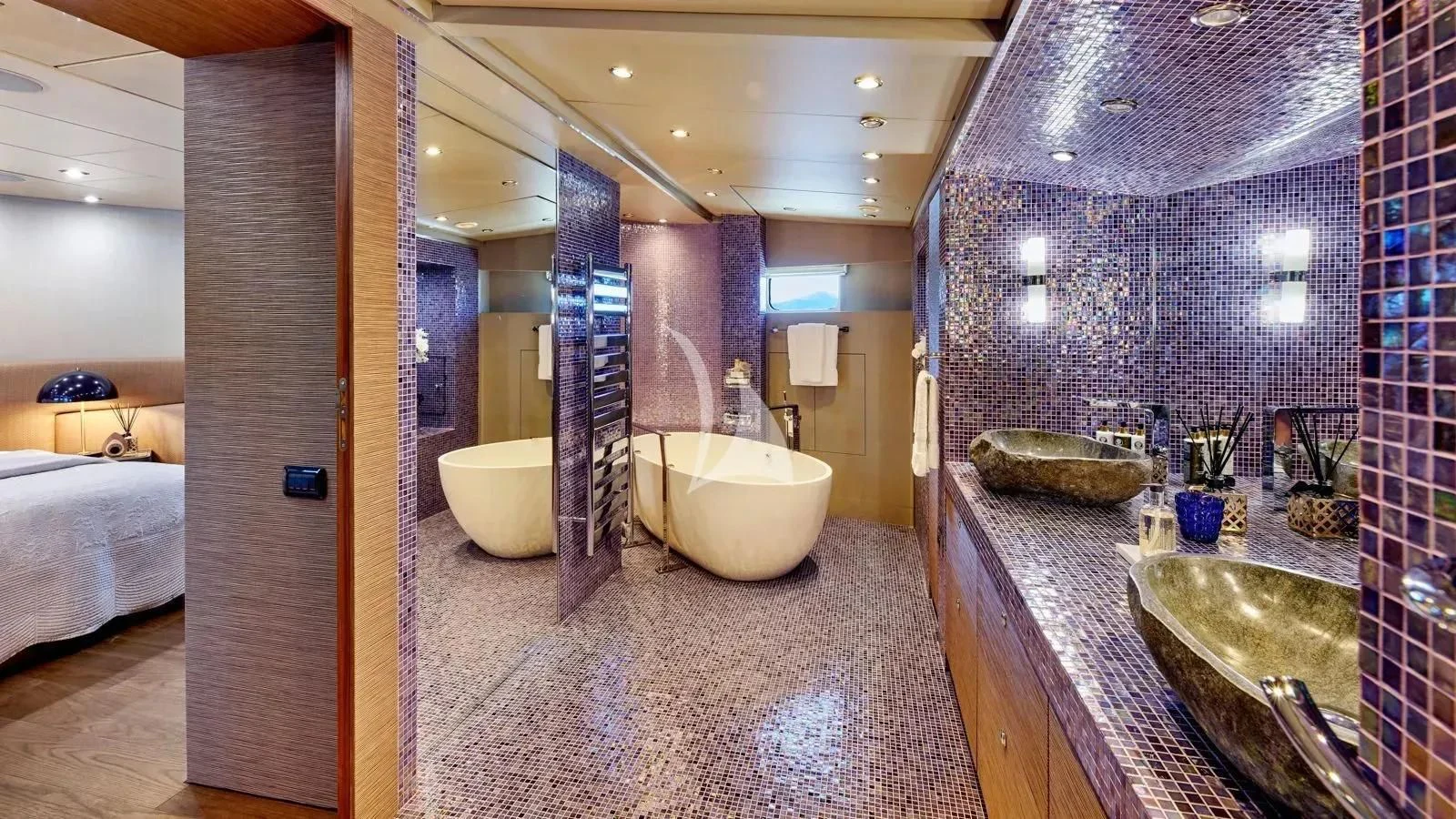 a bathroom with a large marble counter aboard PROMETHEUS I Yacht for Charter