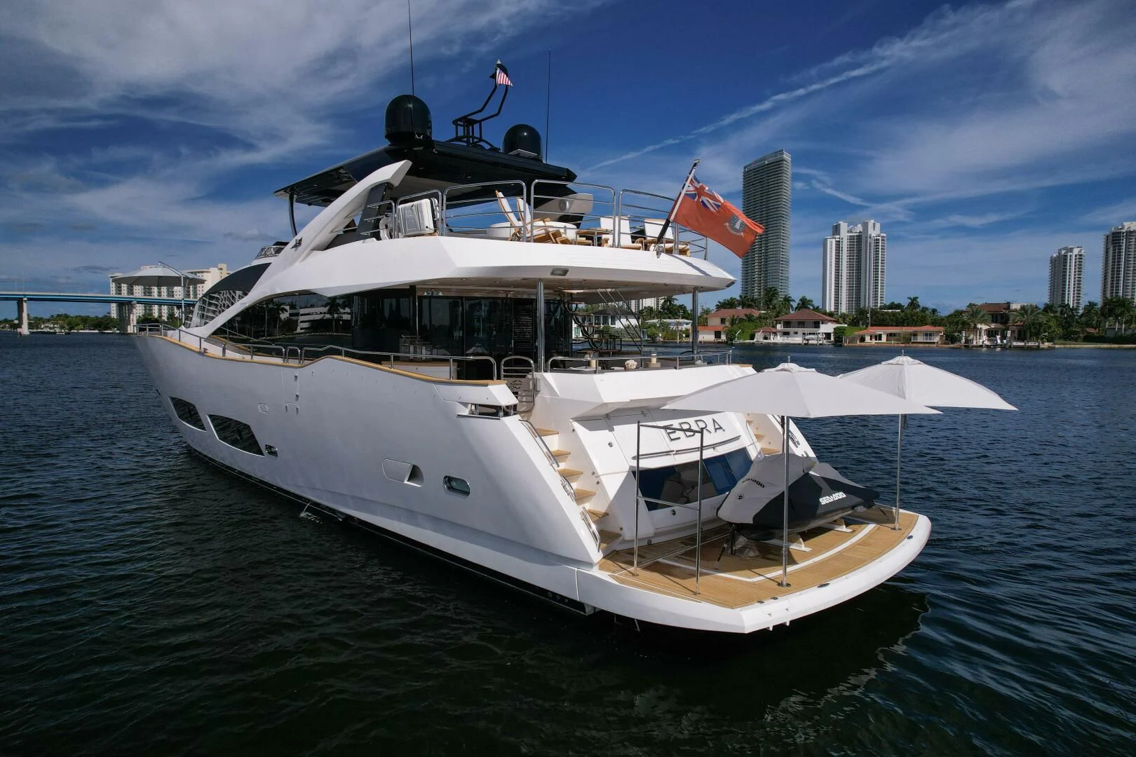 a white boat on the water aboard EBRA Yacht for Sale