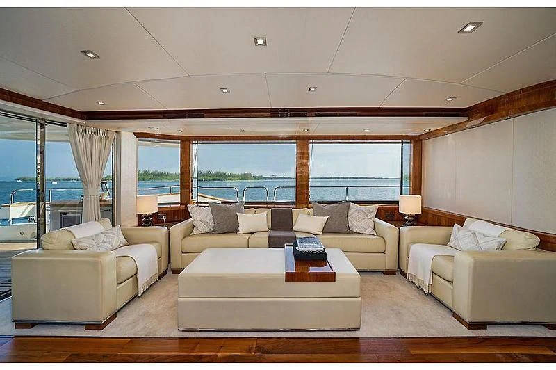 a living room with a large window aboard EBRA Yacht for Sale