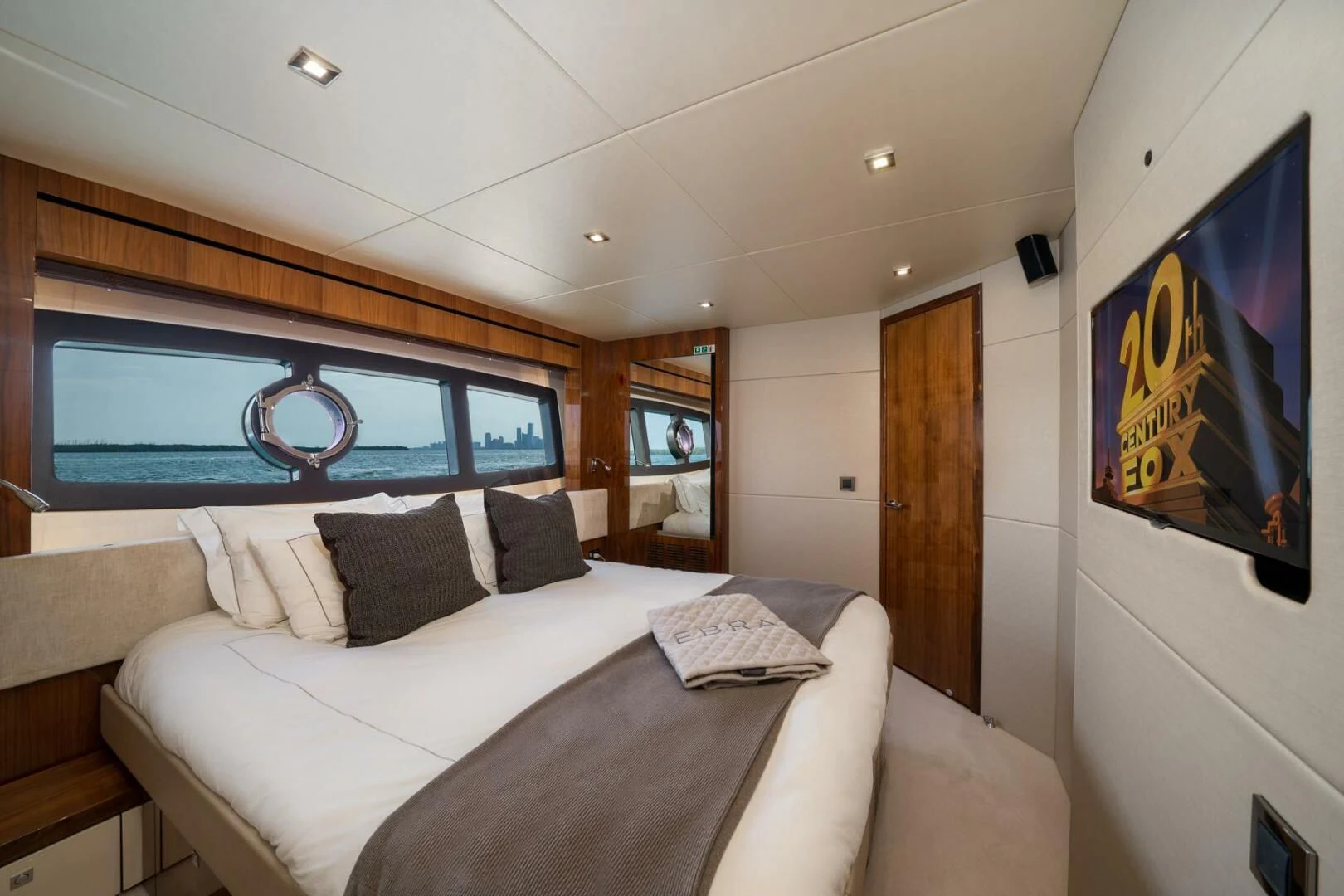 a bed in a room aboard EBRA Yacht for Sale