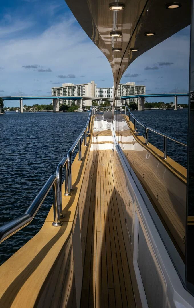 a wooden dock over a body of water aboard EBRA Yacht for Sale