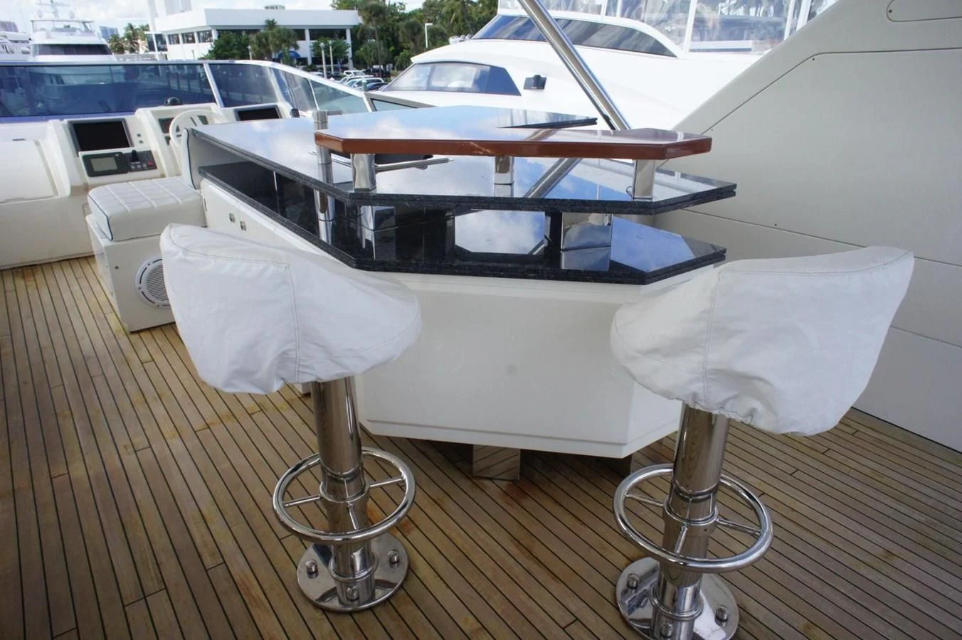 a table with chairs on it aboard CASPIAN Yacht for Sale