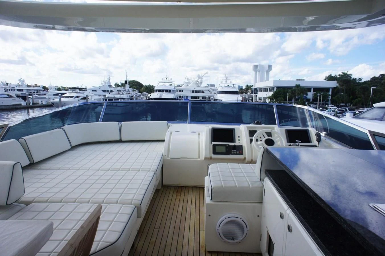 a deck with a large cruise ship in the background aboard CASPIAN Yacht for Sale