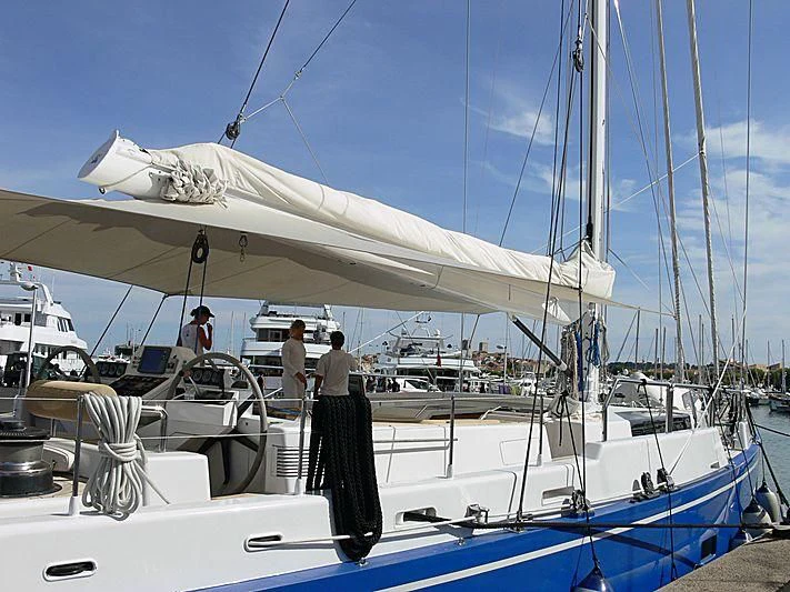 a boat with a white sail aboard RIPPLE Yacht for Sale