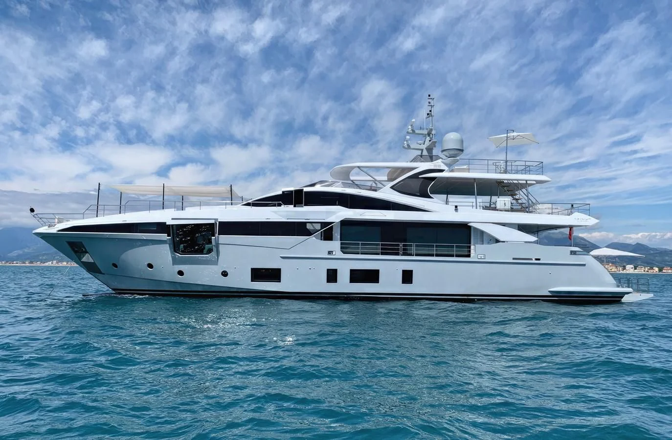 a white yacht in the water aboard ECLIPSE Yacht for Sale