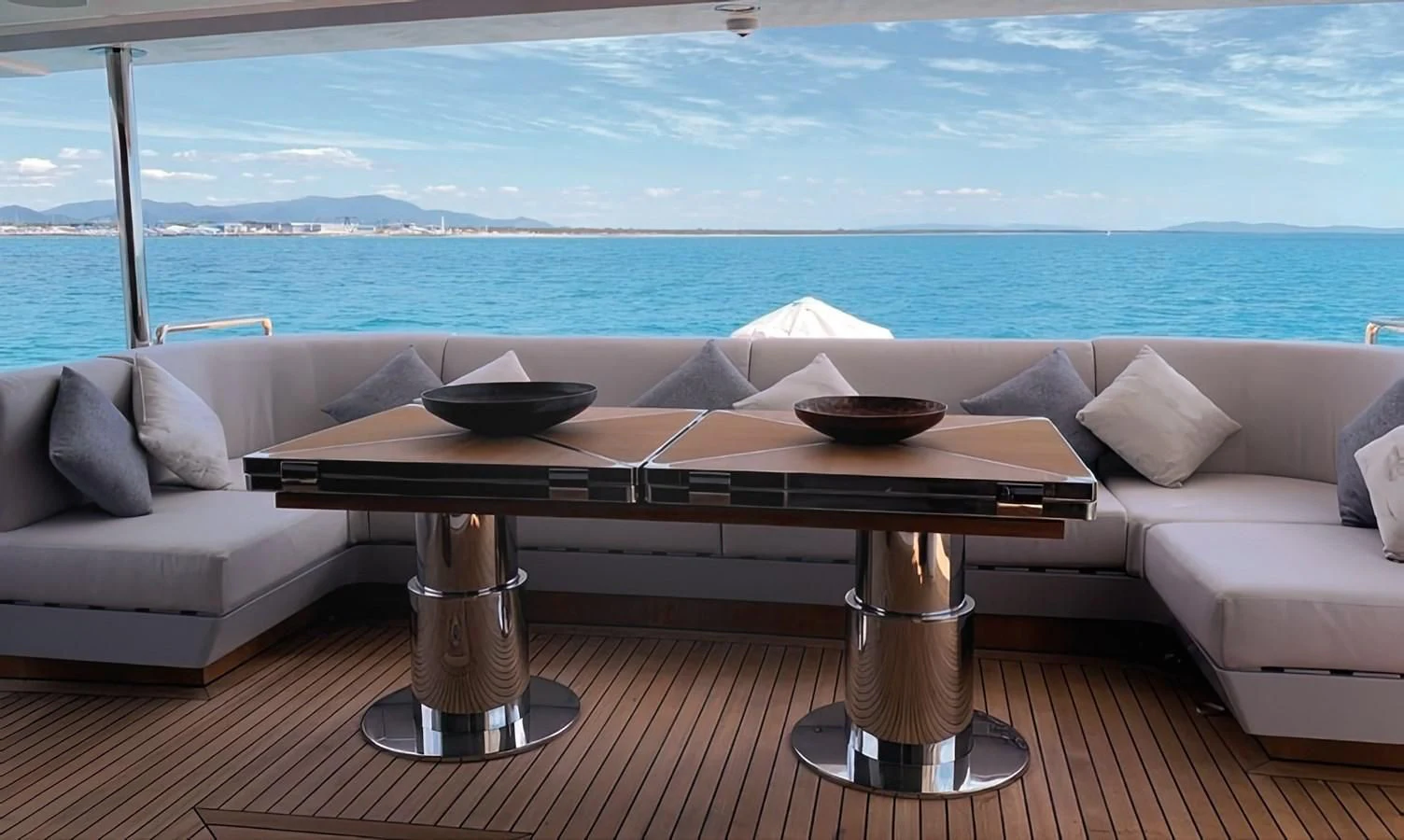 a table with a bowl on it aboard ECLIPSE Yacht for Sale
