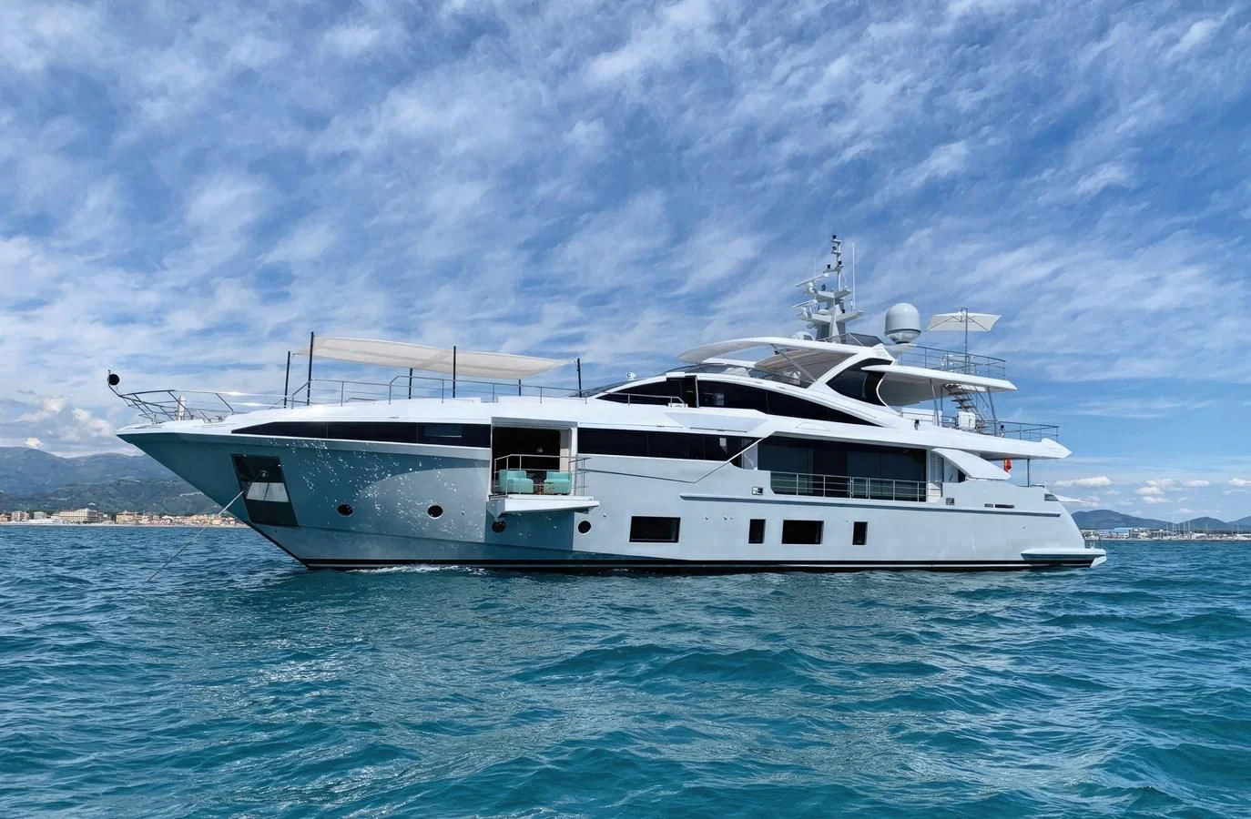 a white yacht in the water aboard ECLIPSE Yacht for Sale