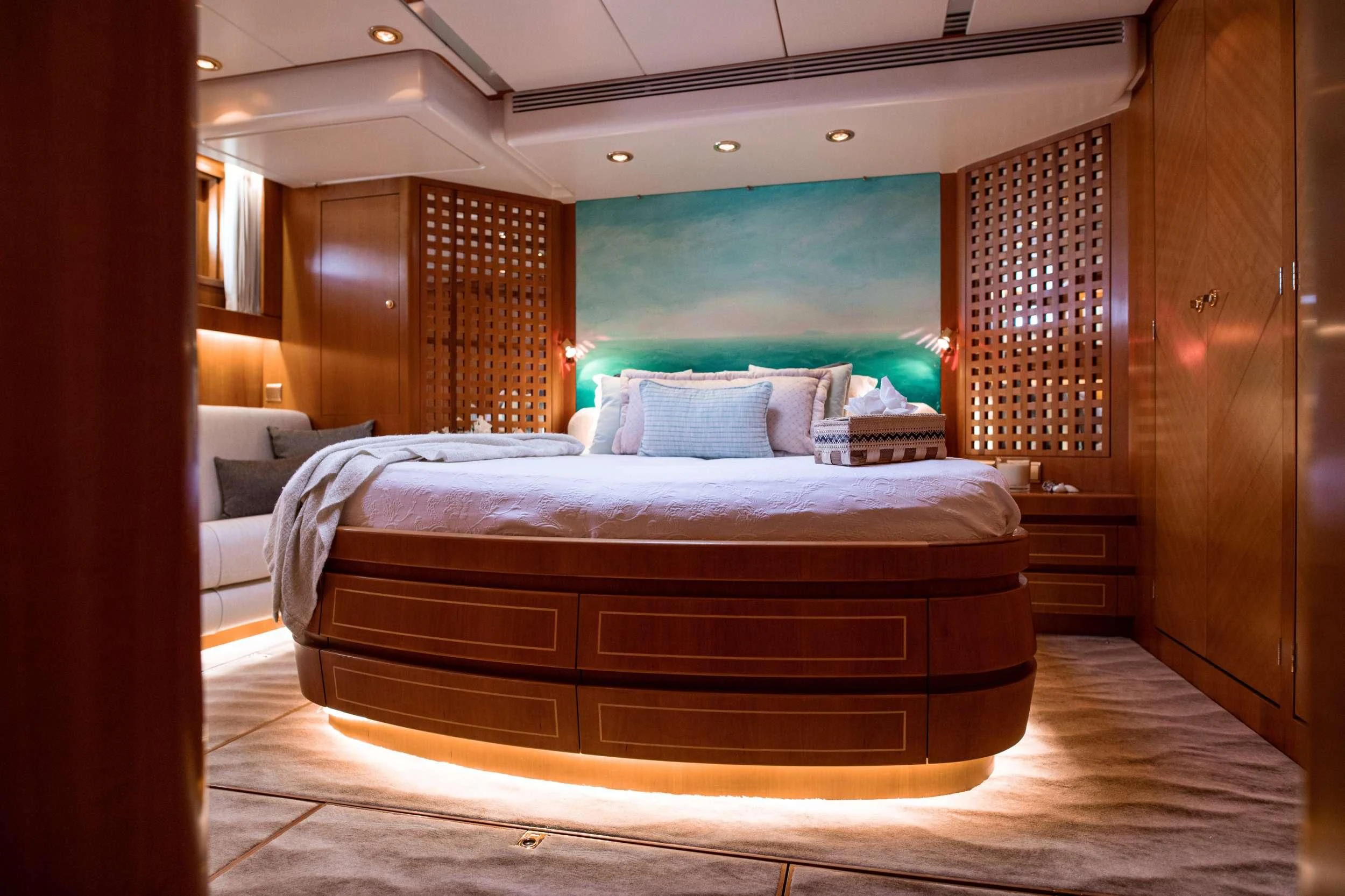 a bed in a room aboard SCARENA Yacht for Charter
