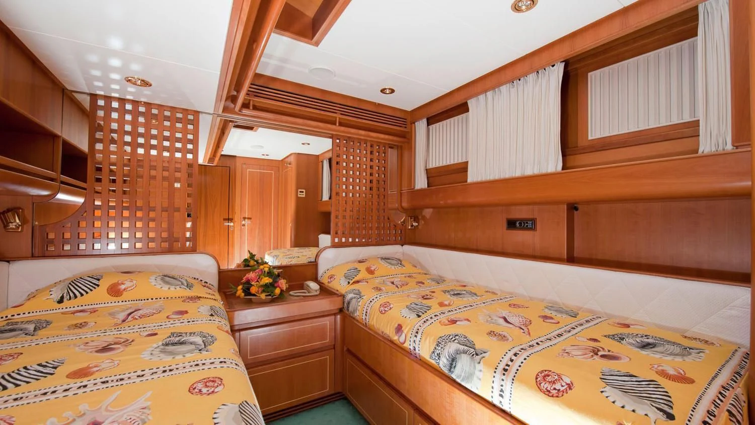 a room with bunk beds aboard SCARENA Yacht for Charter