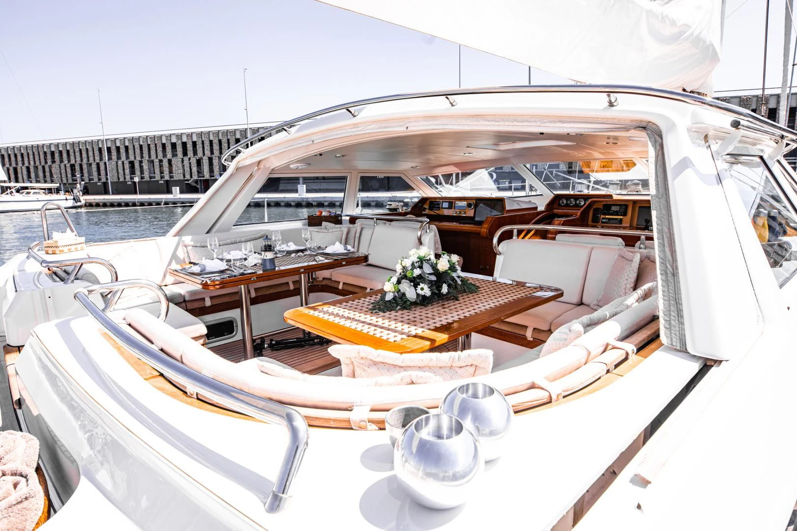 a boat with a table and chairs aboard SCARENA Yacht for Charter