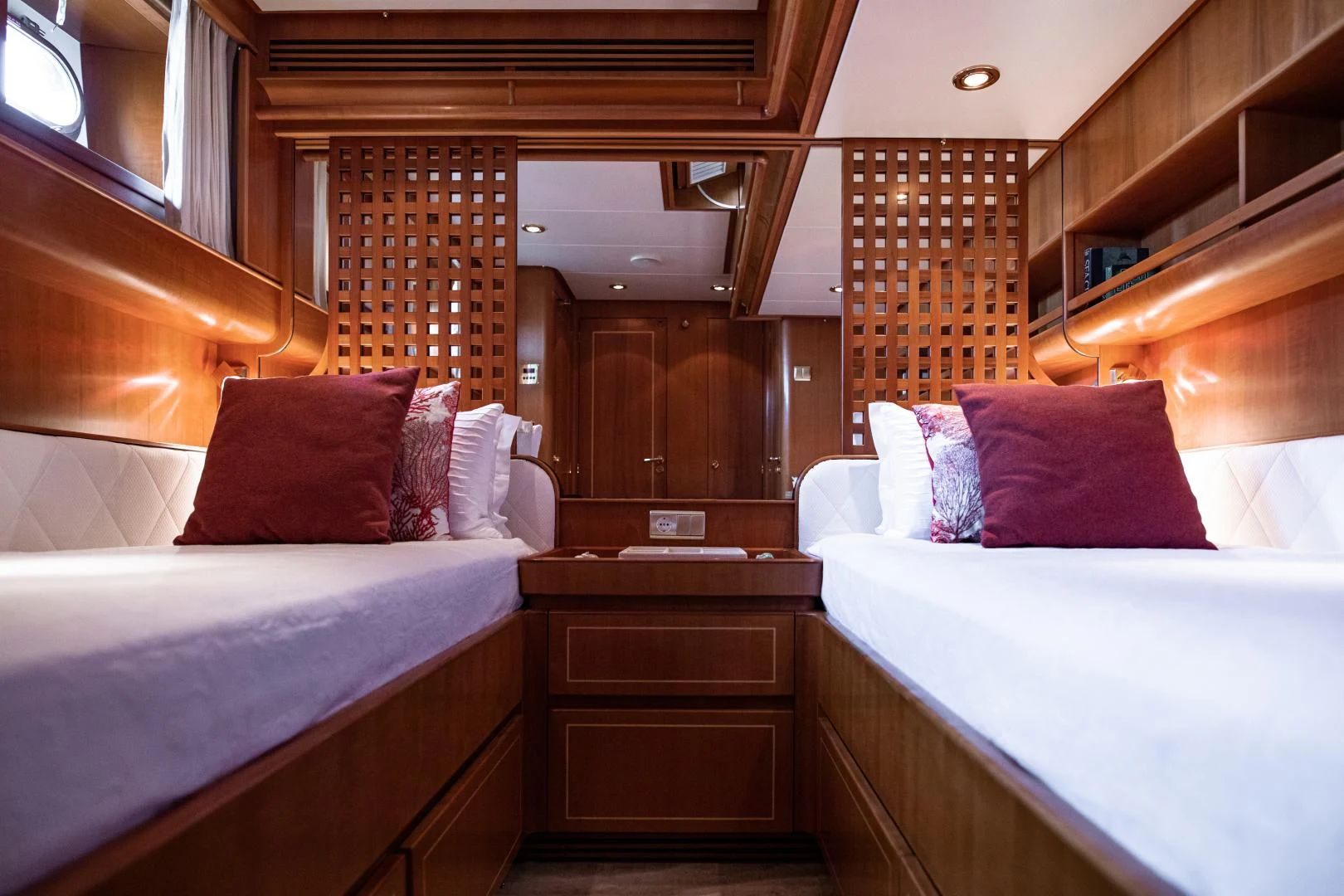 a couple of beds in a cabin aboard SCARENA Yacht for Charter