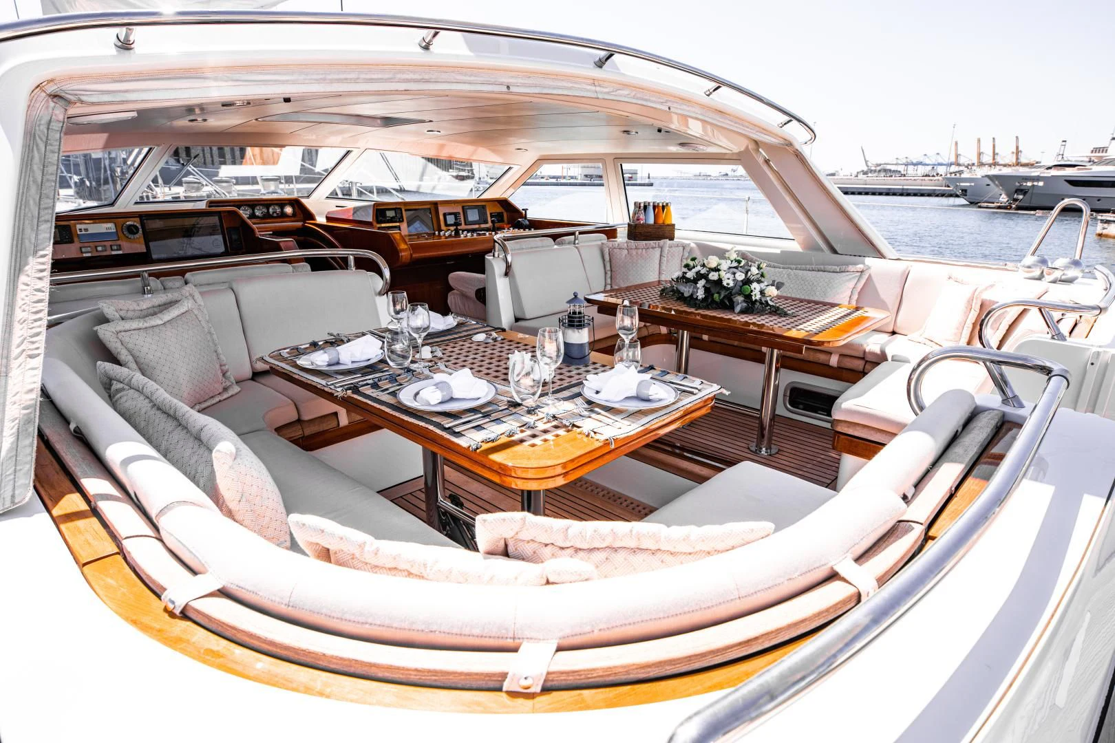 a boat with a table and chairs aboard SCARENA Yacht for Charter
