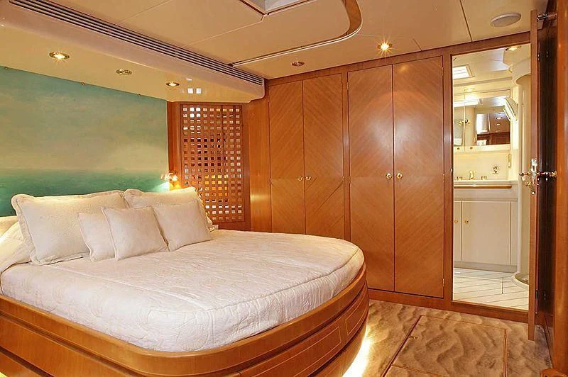 a bed in a room aboard SCARENA Yacht for Charter