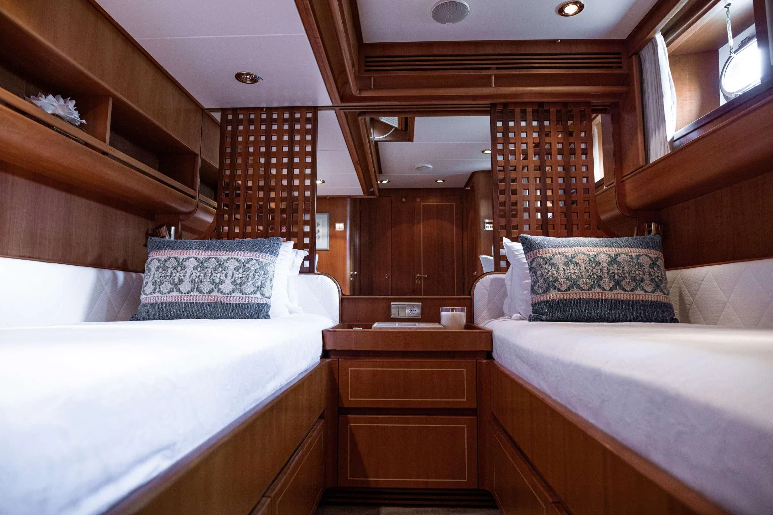 a room with two beds aboard SCARENA Yacht for Charter