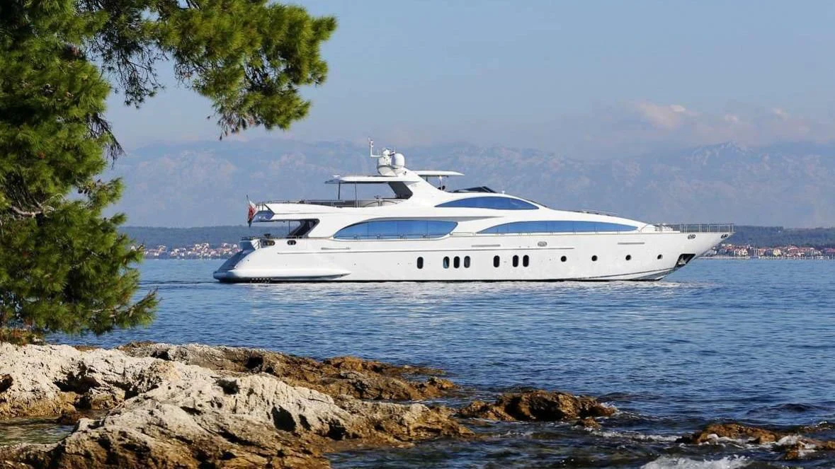 a white yacht on the water aboard ARTEMY Yacht for Sale