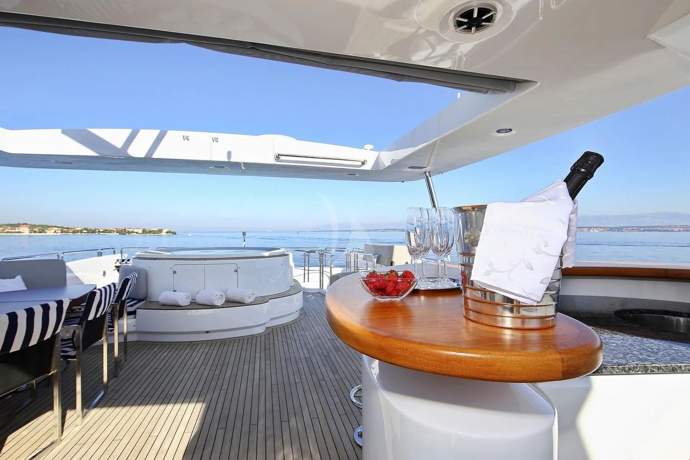 a boat with a table and chairs aboard ARTEMY Yacht for Sale