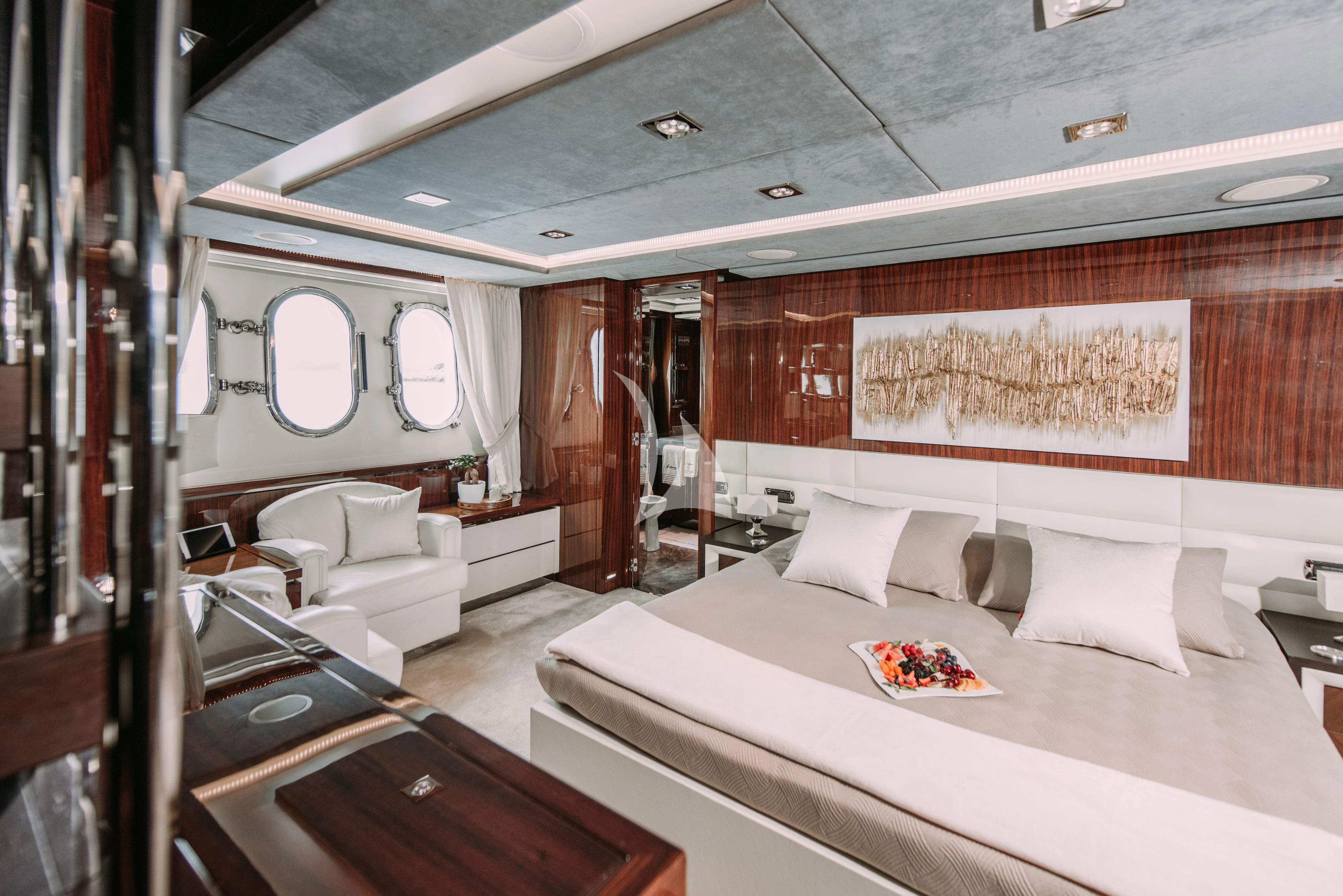 a room with a bed and a couch aboard ARTEMY Yacht for Sale