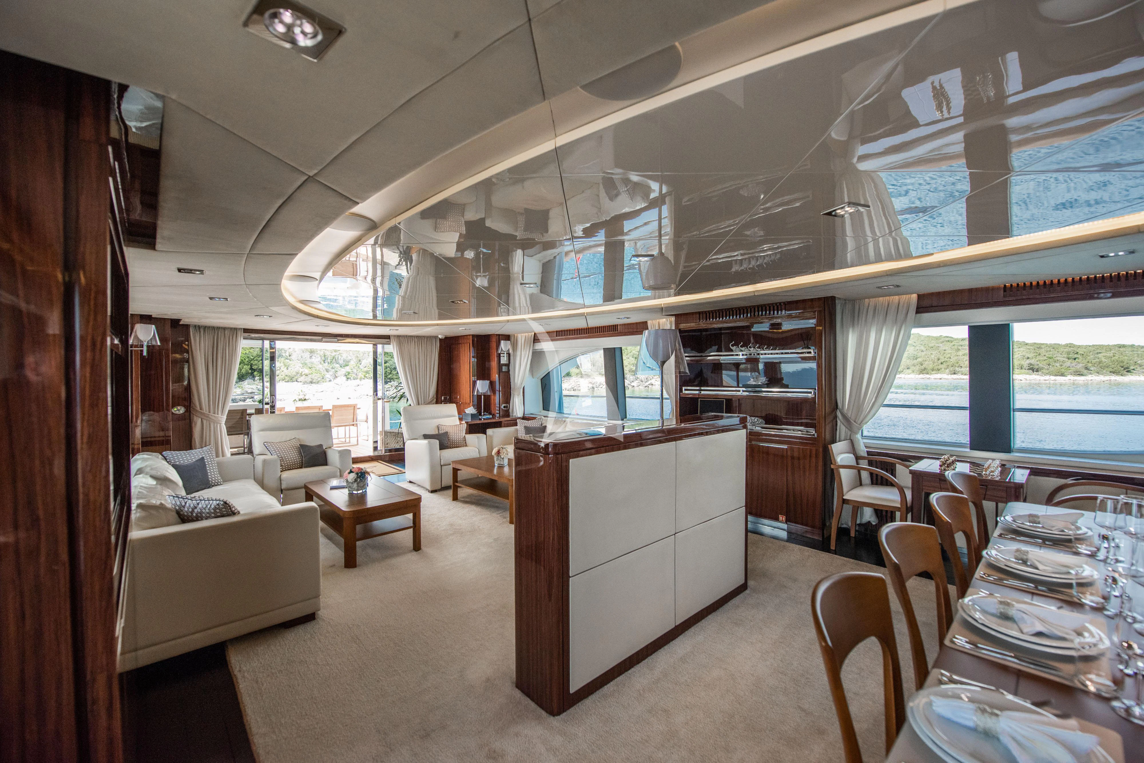 a living room with a large window aboard ARTEMY Yacht for Sale