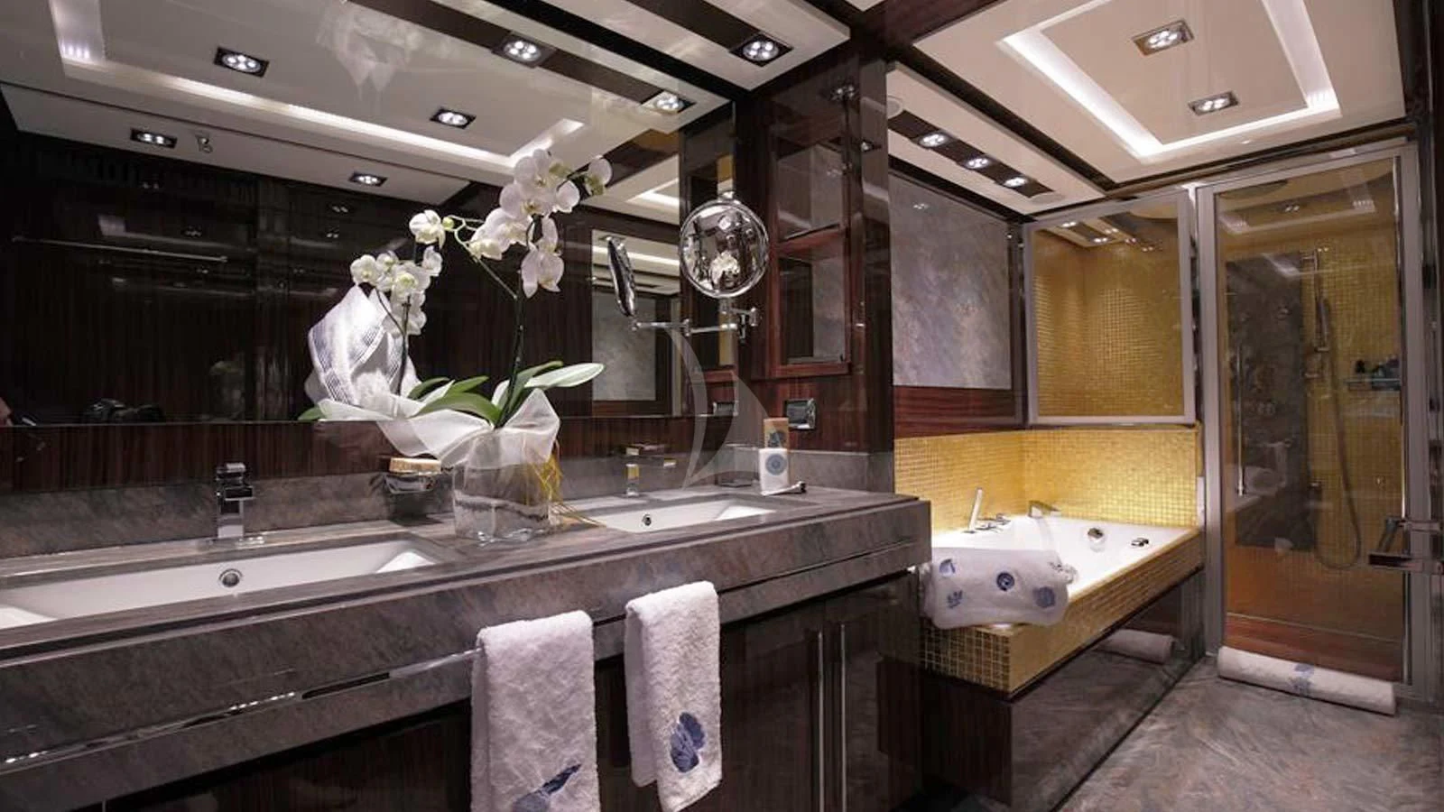 a bathroom with a large mirror aboard ARTEMY Yacht for Sale