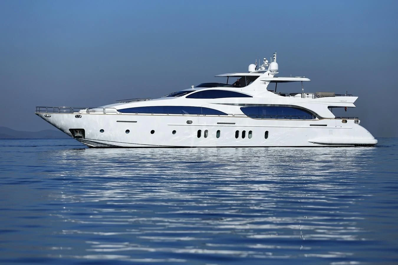 a white yacht in the water aboard ARTEMY Yacht for Sale