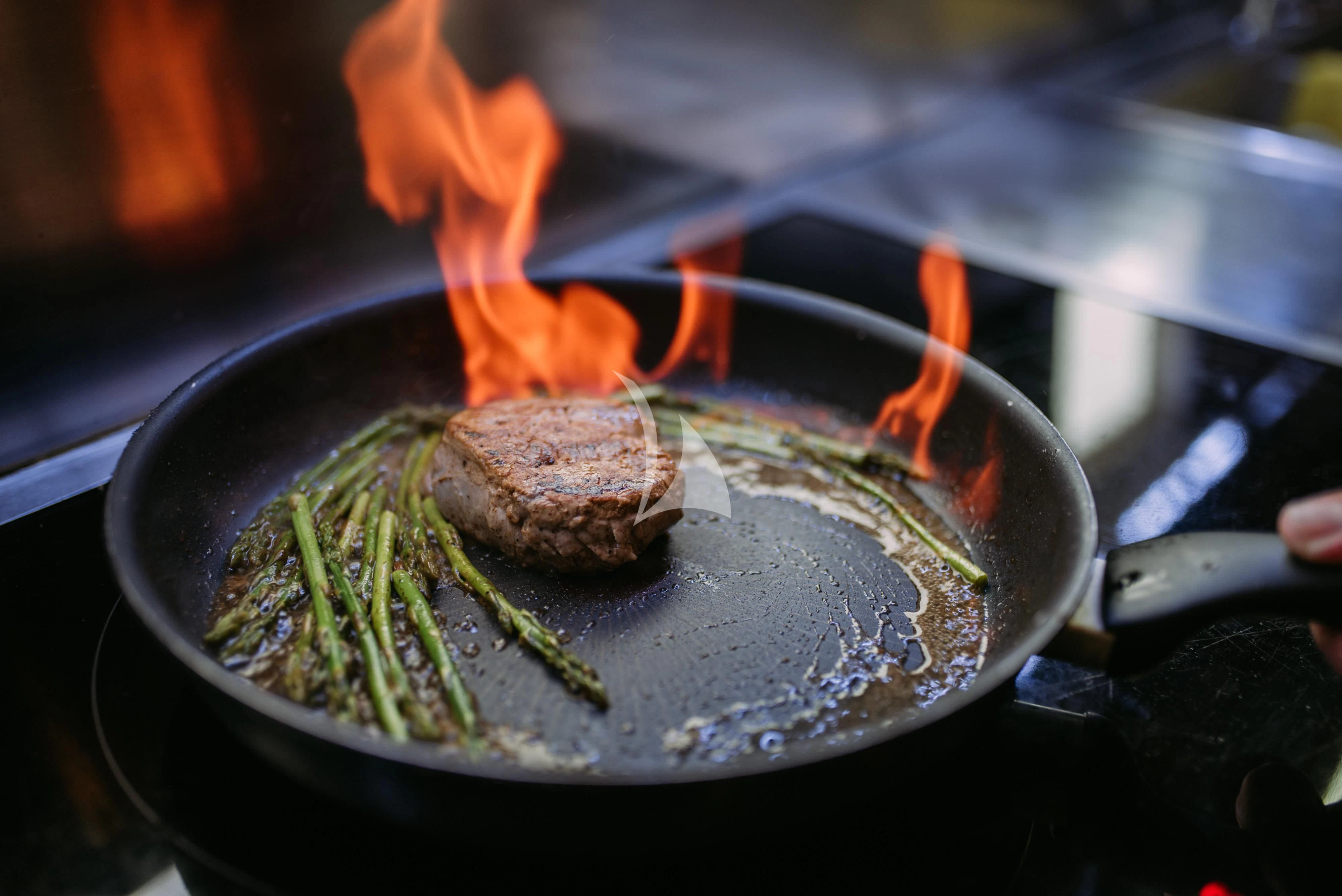 a burger on a plate aboard ARTEMY Yacht for Sale