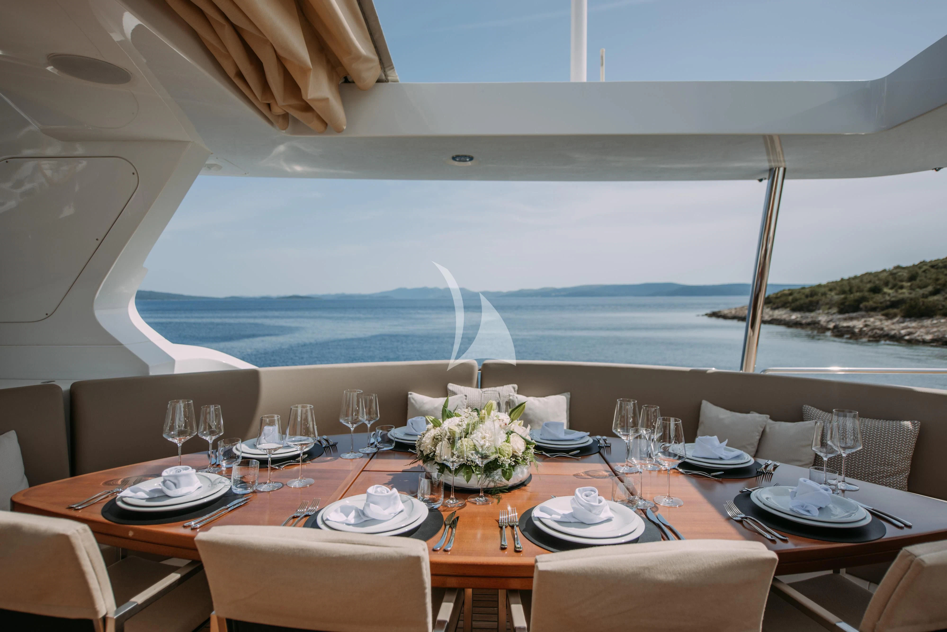 a table set for a dinner aboard ARTEMY Yacht for Sale