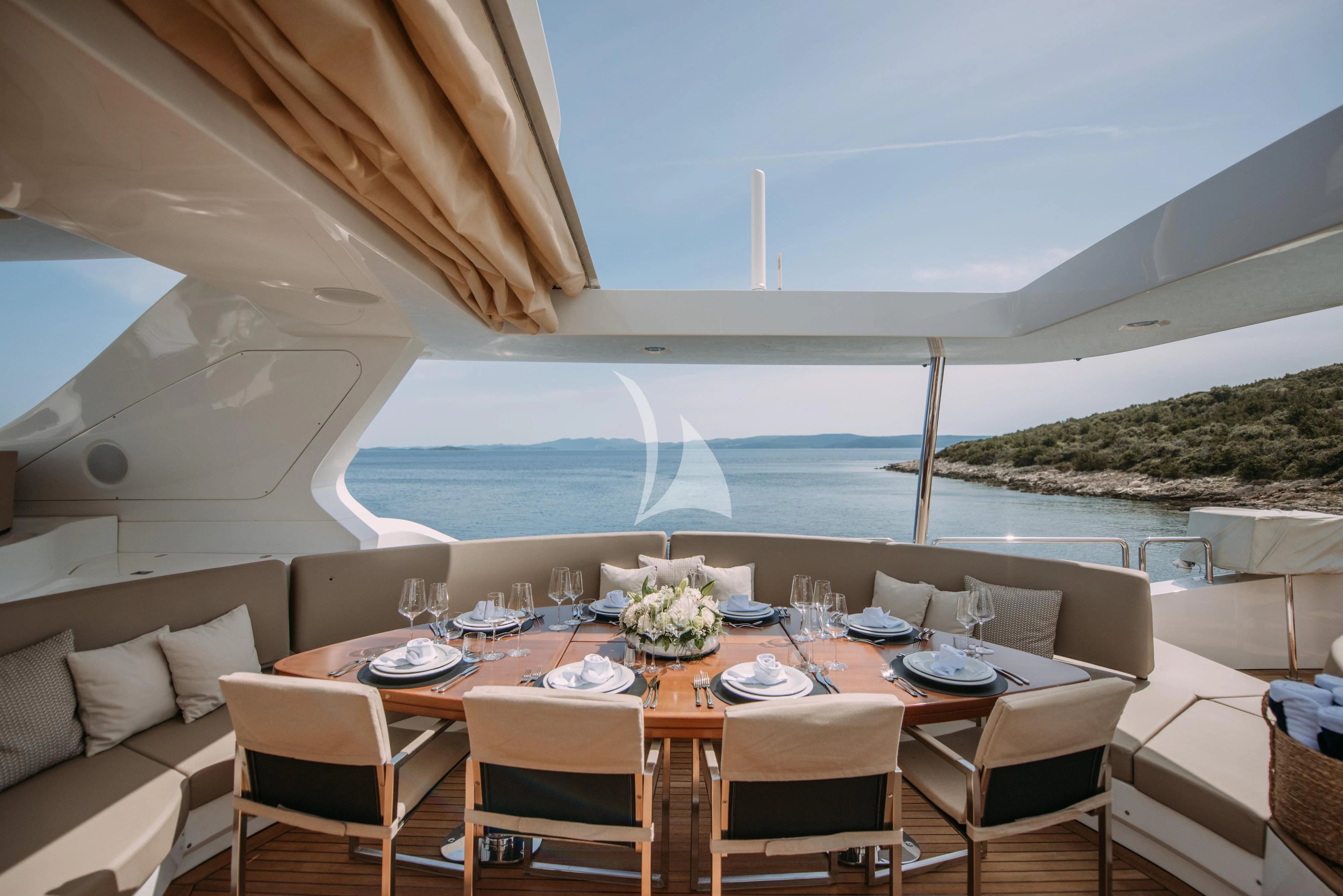 a dining table on a boat aboard ARTEMY Yacht for Sale
