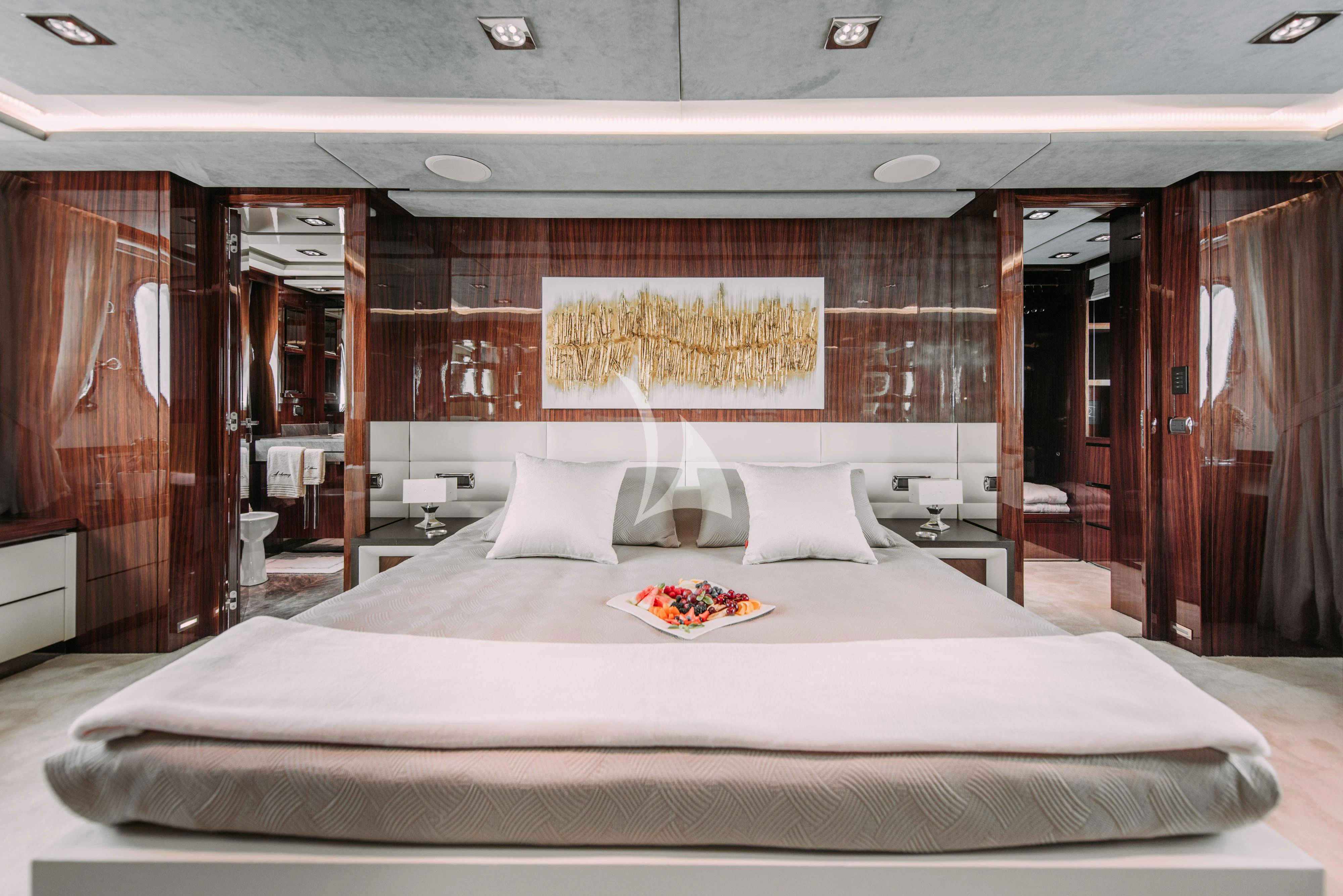 a large bed in a room aboard ARTEMY Yacht for Sale
