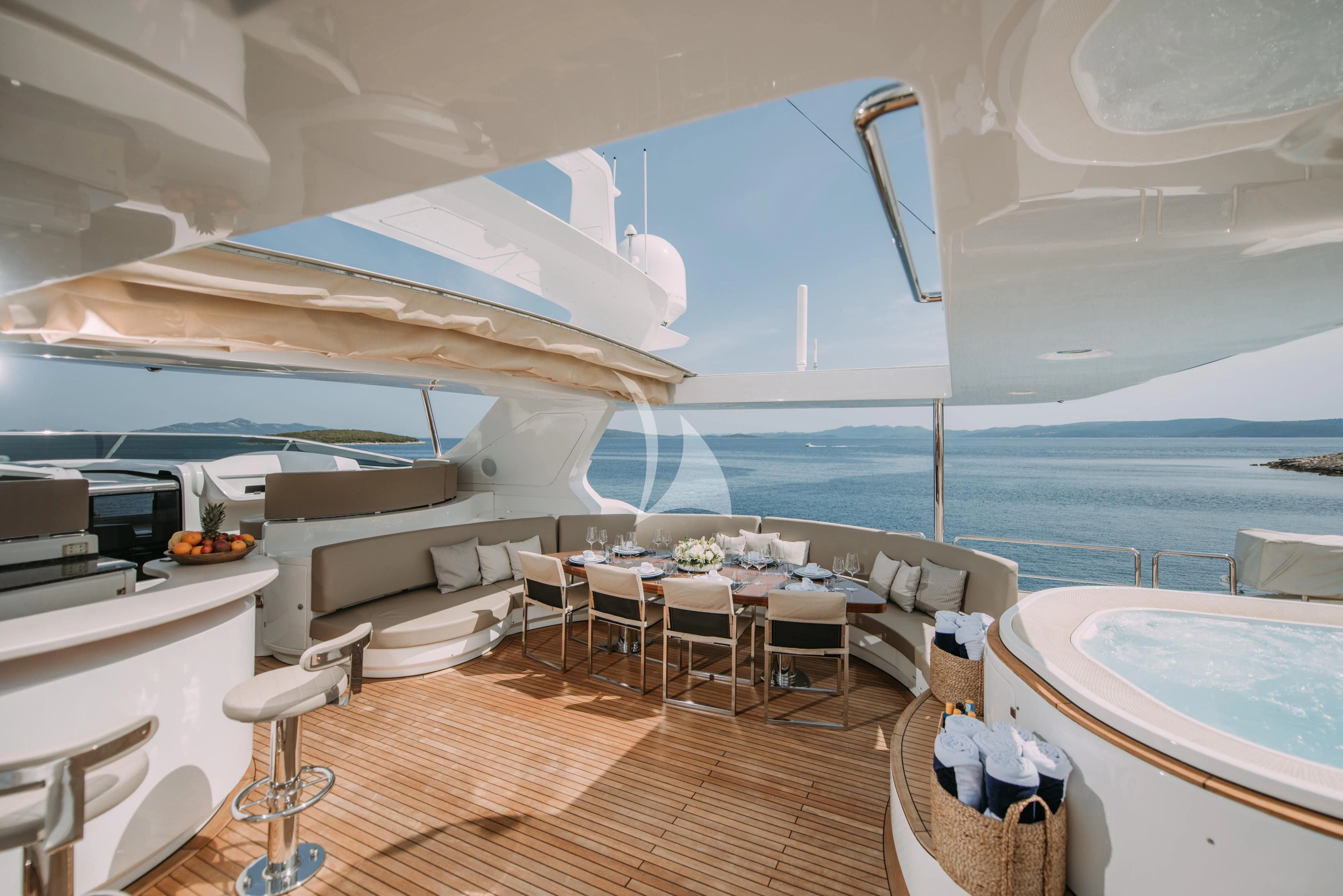 a room with a table and chairs aboard ARTEMY Yacht for Sale