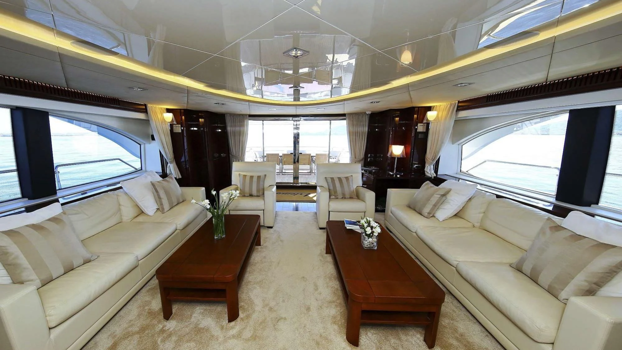 a living room with a large window aboard ARTEMY Yacht for Sale