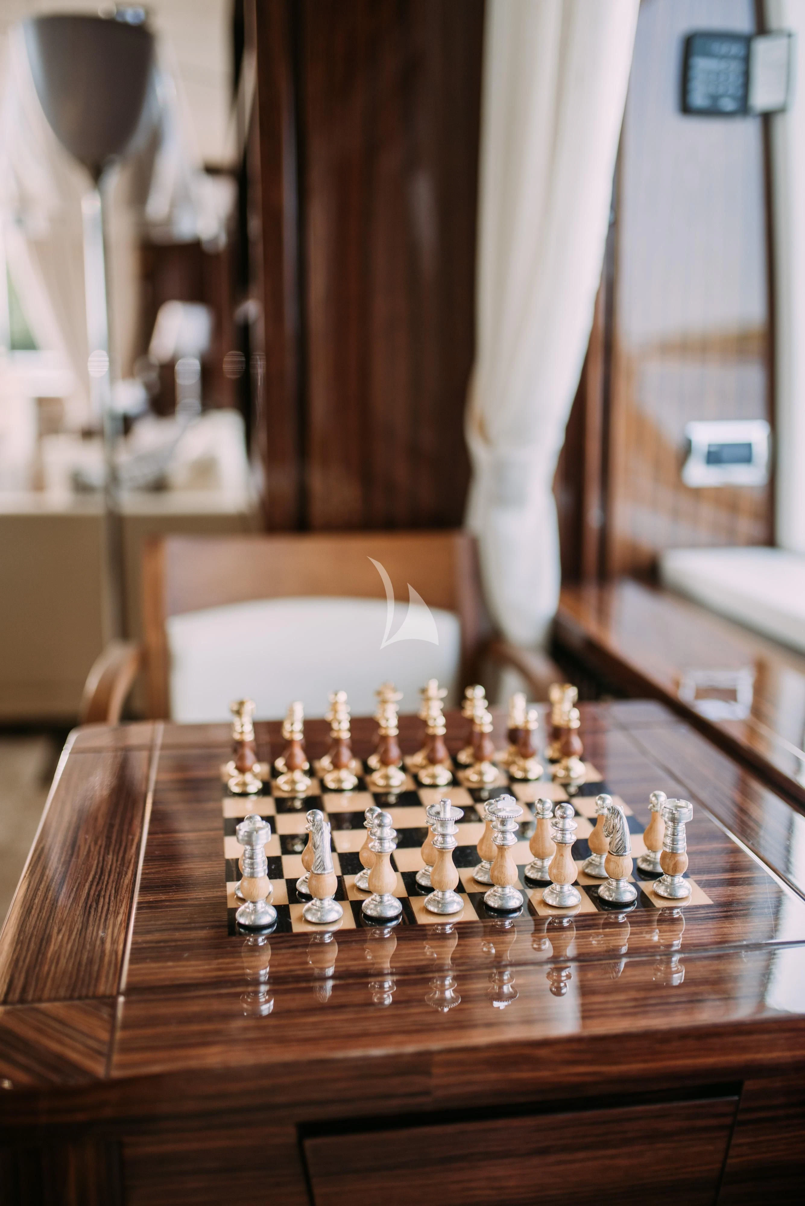 a chess board with a chess board aboard ARTEMY Yacht for Sale