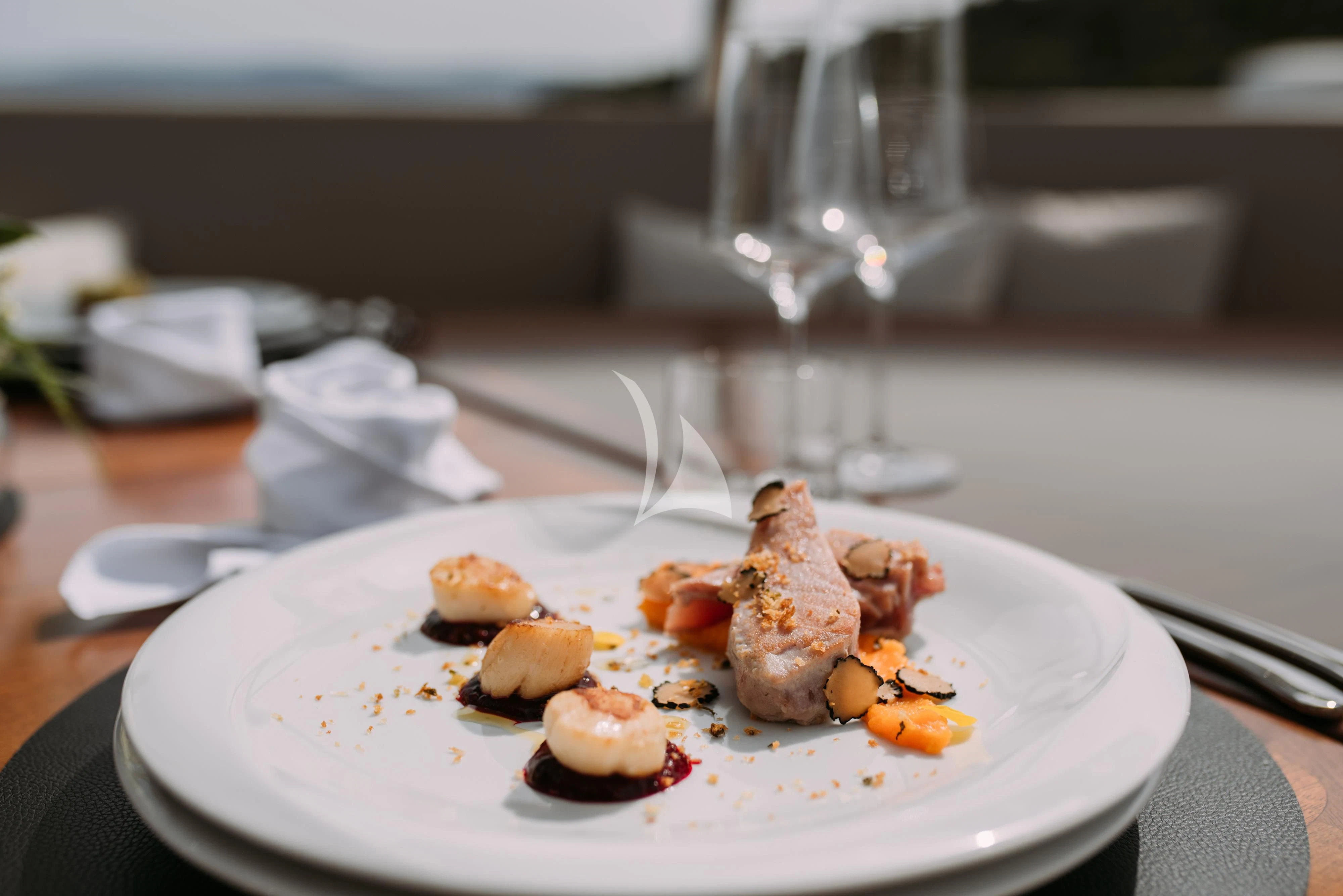 a plate of food aboard ARTEMY Yacht for Sale