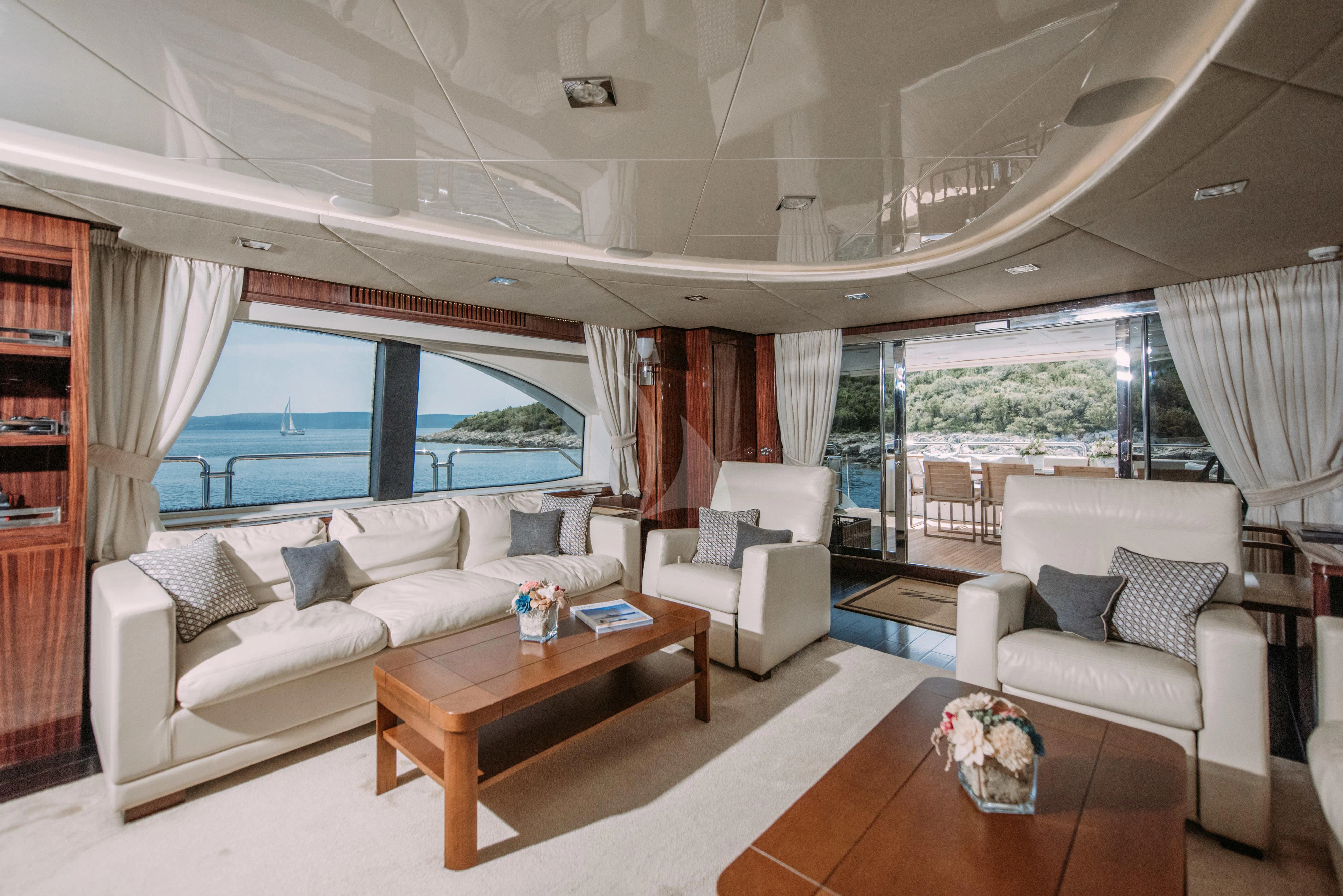 a living room with a large window aboard ARTEMY Yacht for Sale