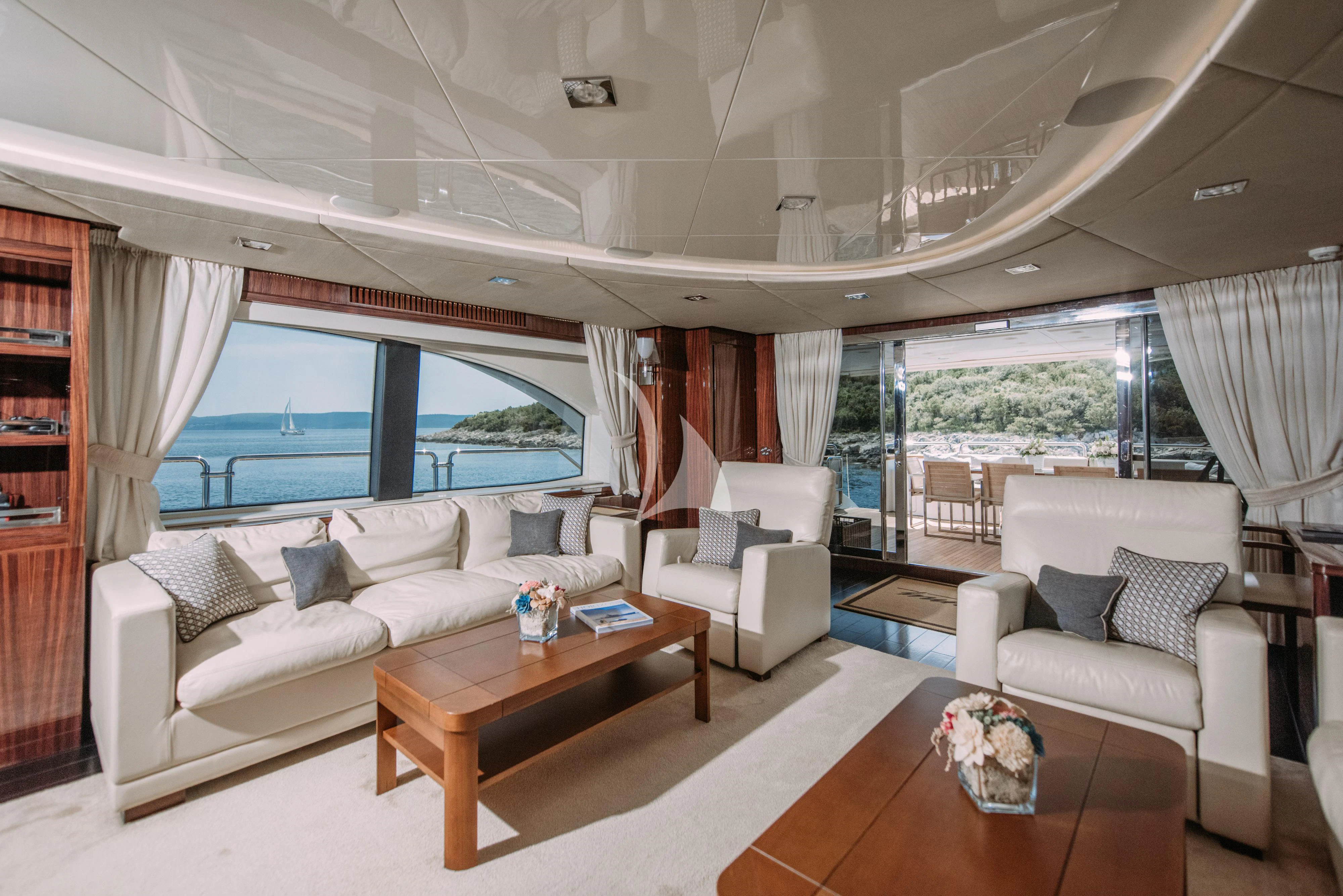 a living room with a large window aboard ARTEMY Yacht for Sale