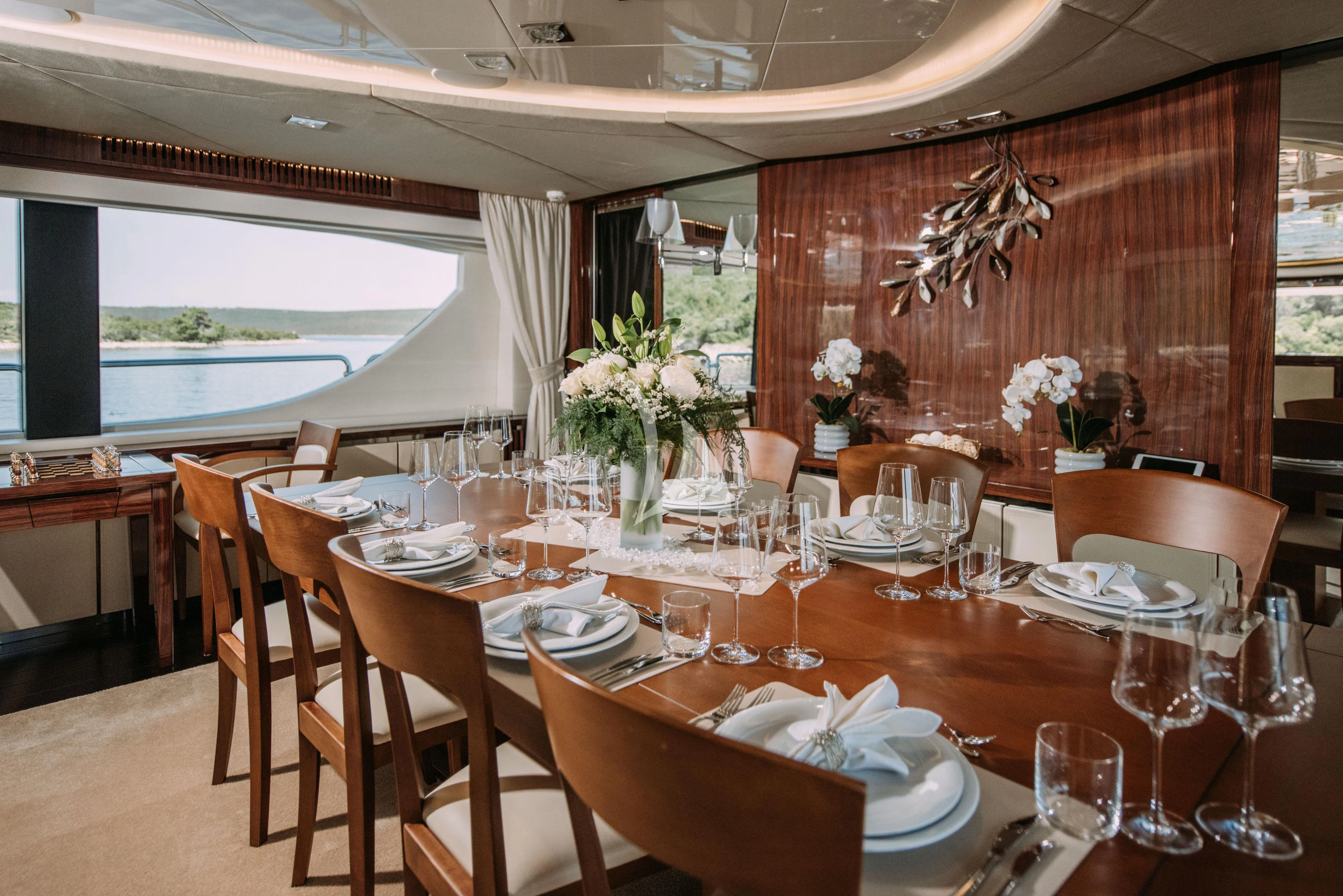 a table set for a wedding reception aboard ARTEMY Yacht for Sale