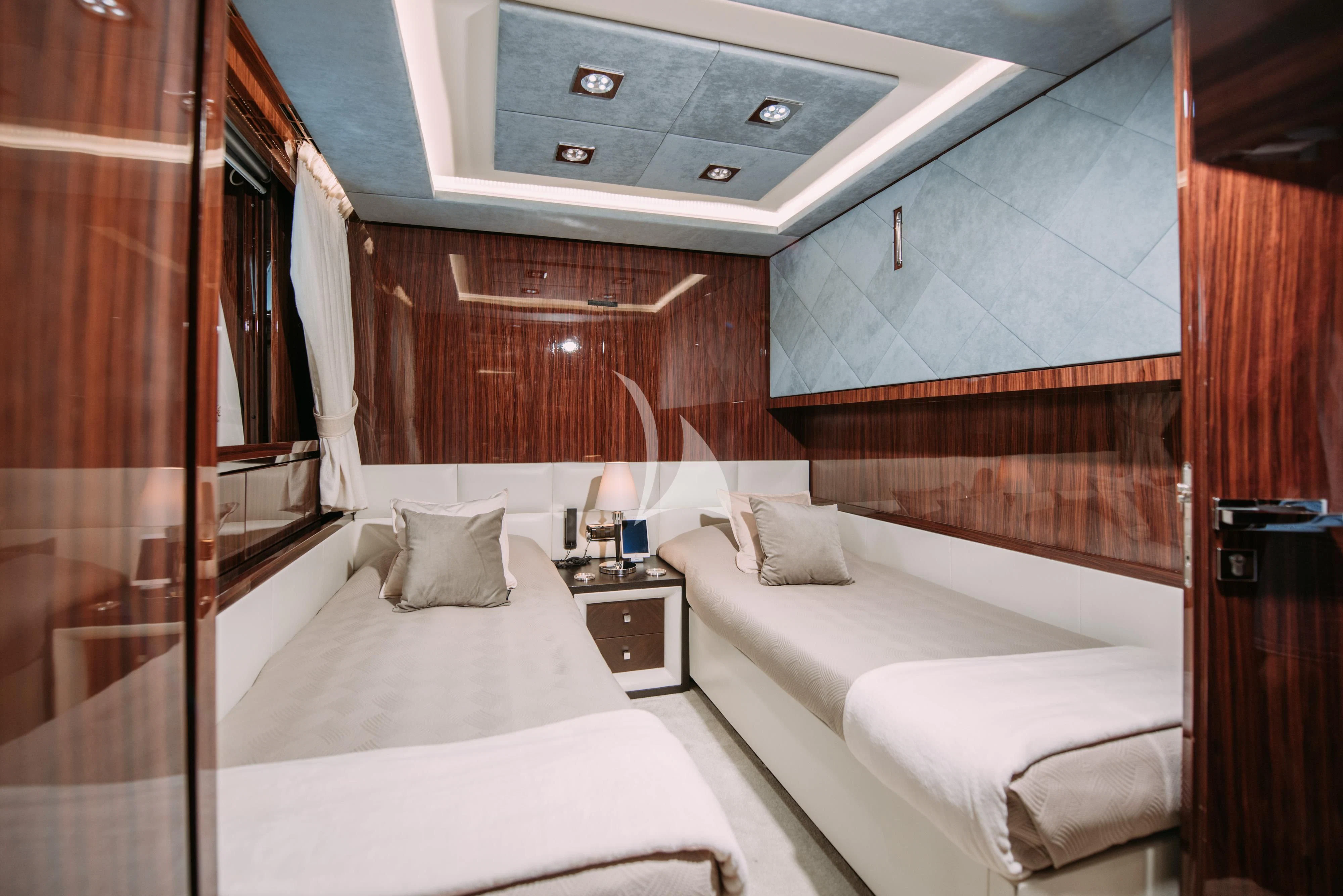 a room with two beds aboard ARTEMY Yacht for Sale