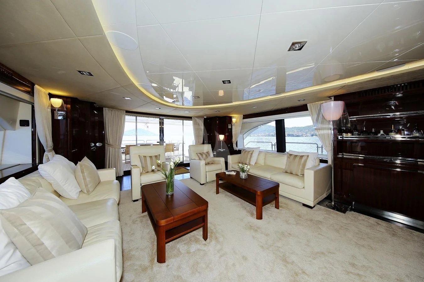 a living room with a large window aboard ARTEMY Yacht for Sale