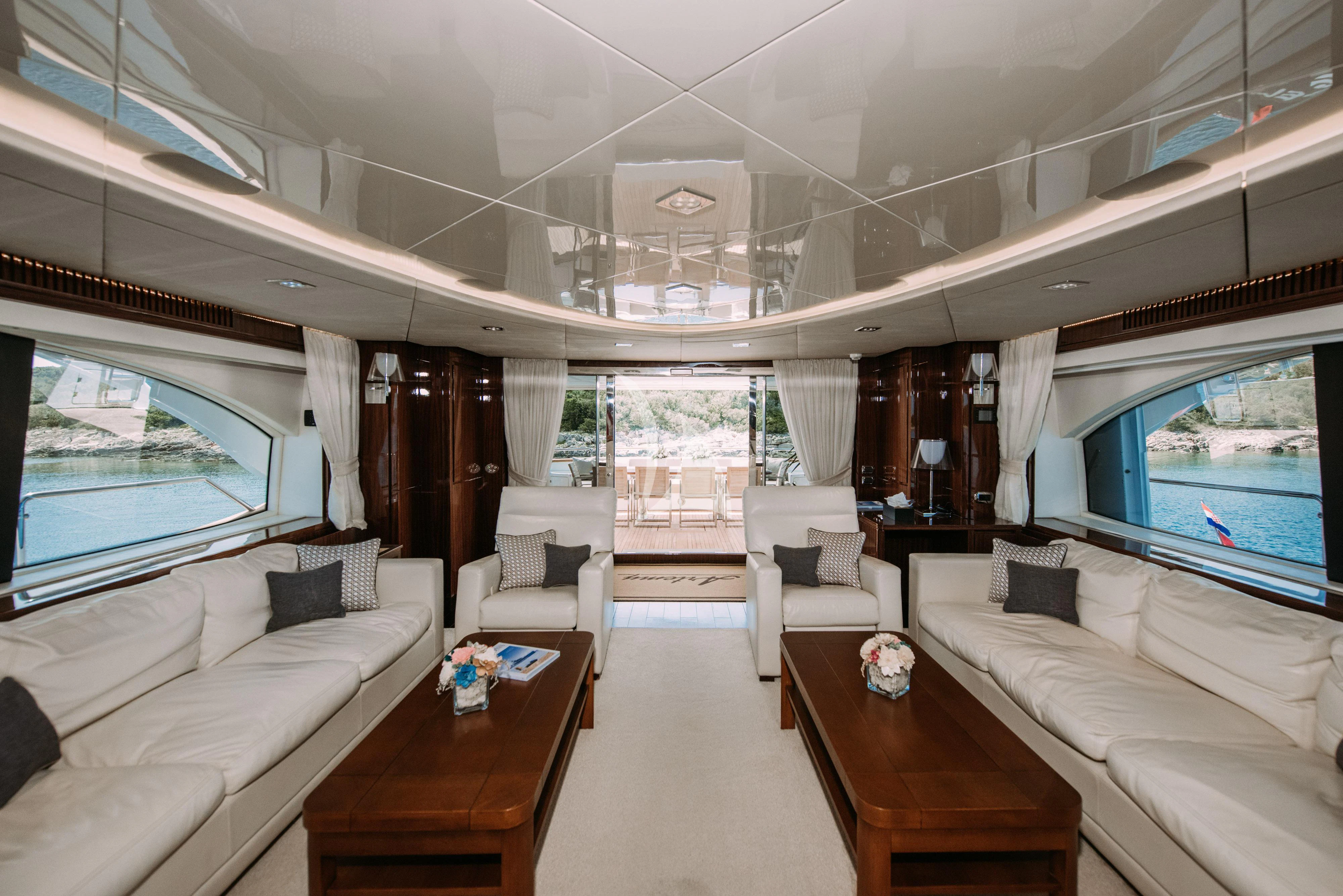 a living room with a large window aboard ARTEMY Yacht for Sale