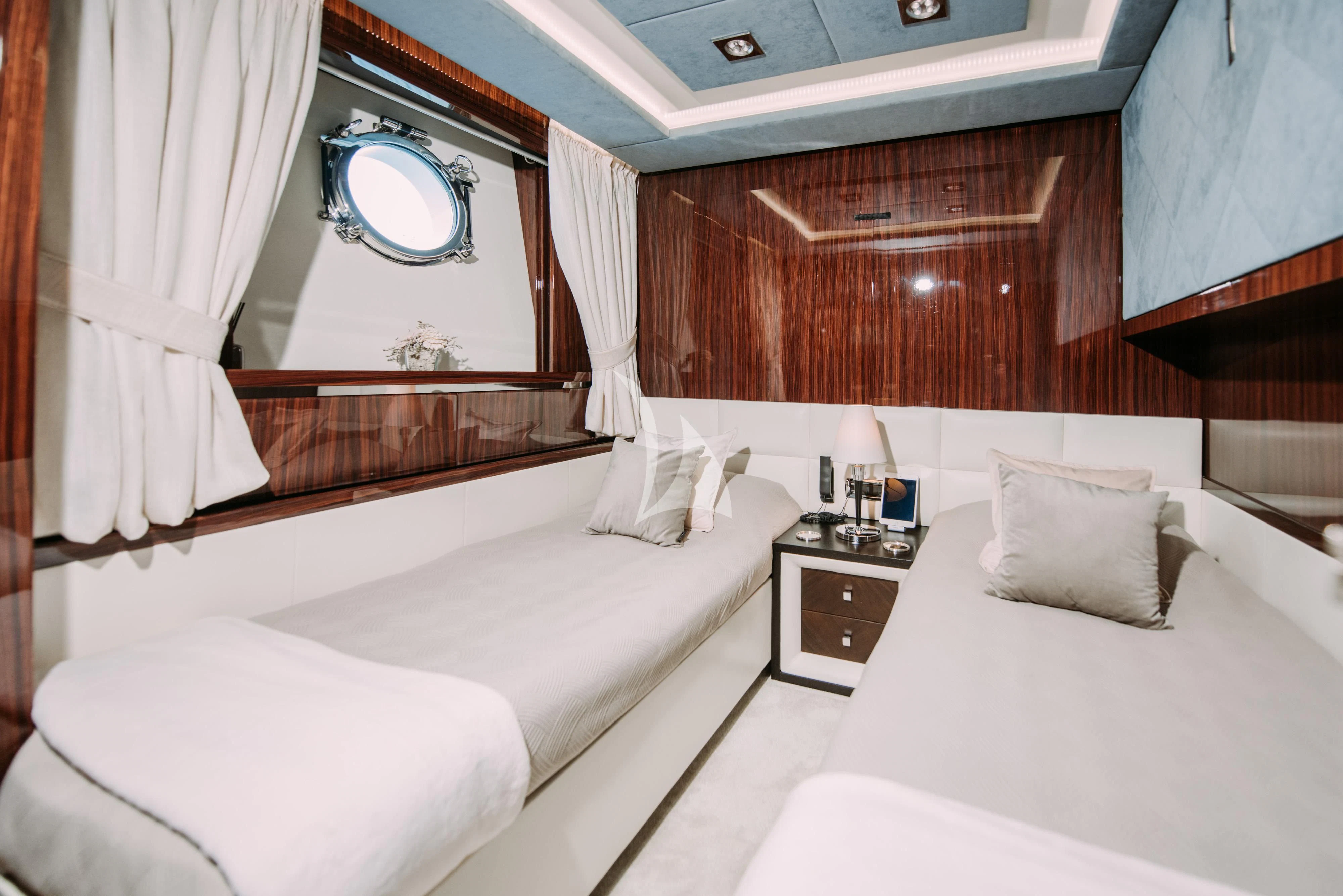 a room with two beds aboard ARTEMY Yacht for Sale