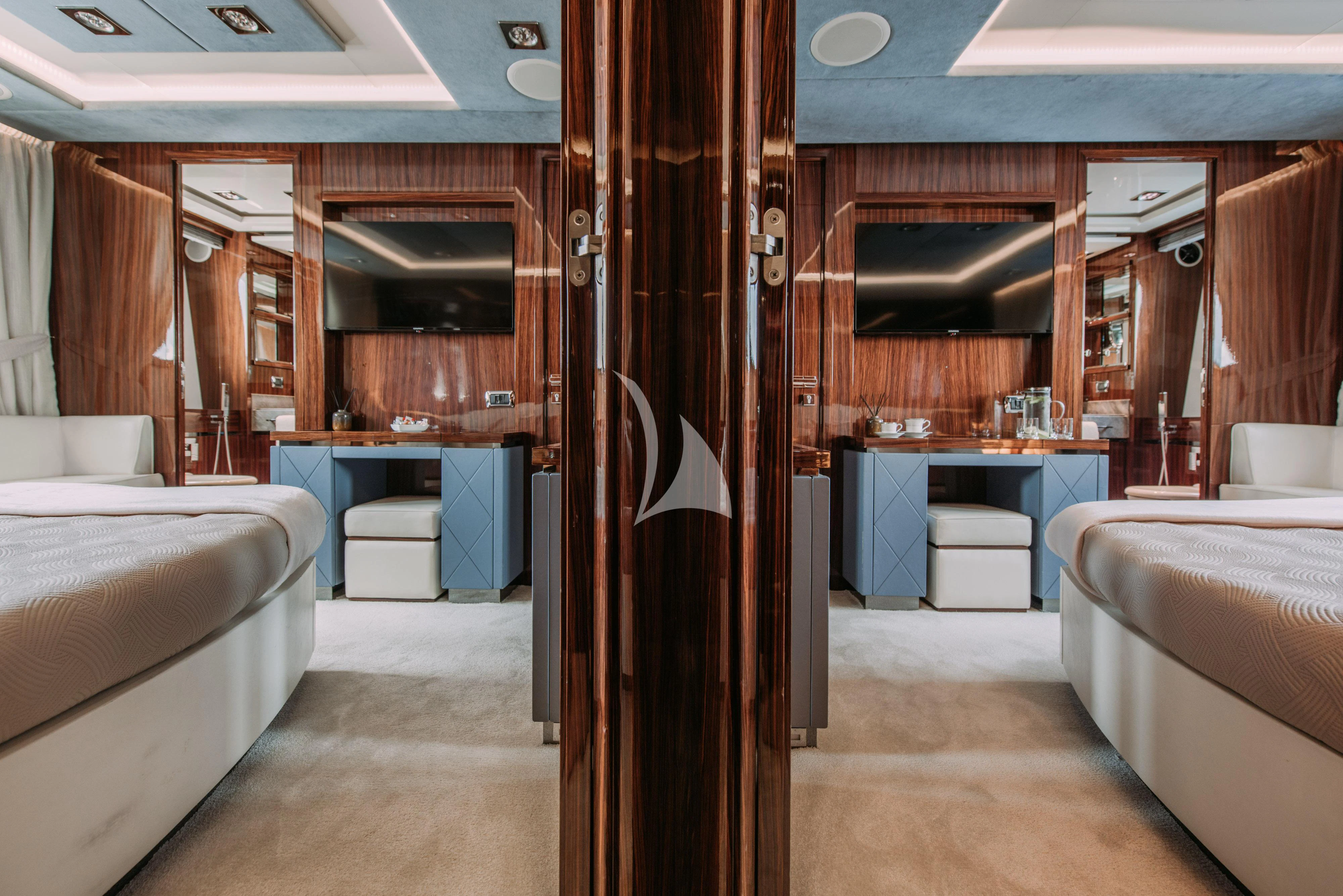 a room with a bed and a sink aboard ARTEMY Yacht for Sale