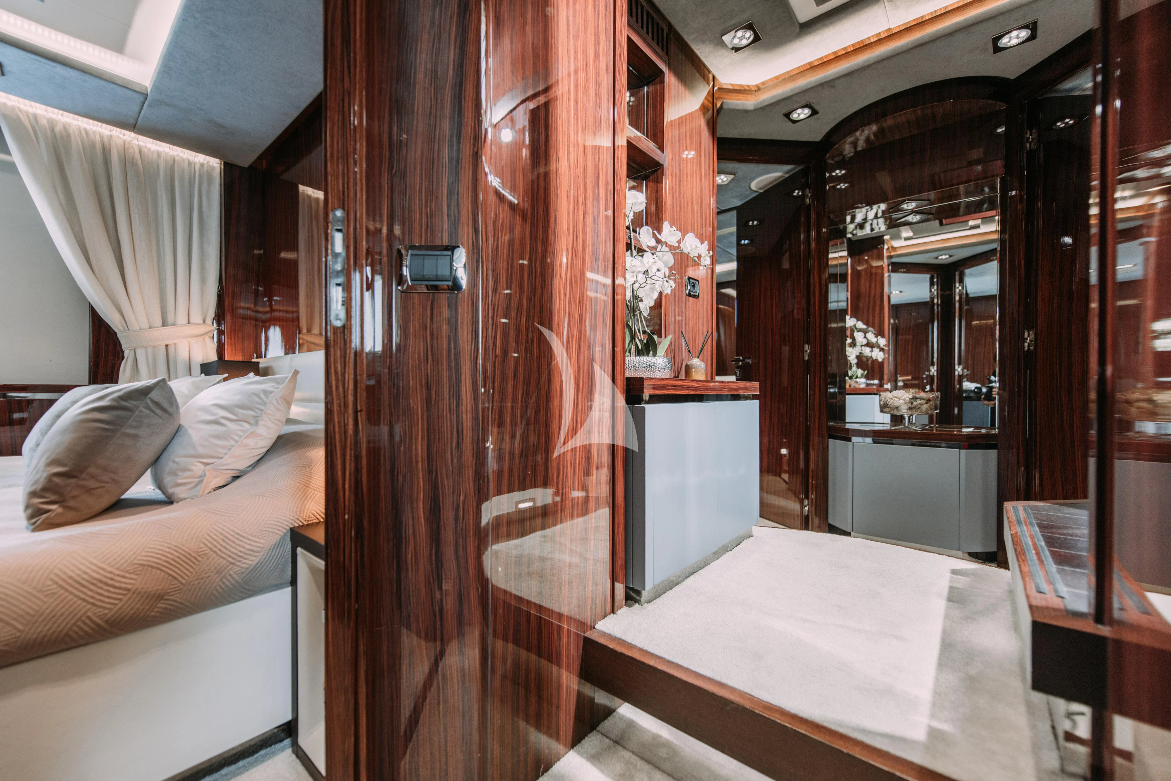 a room with a bed and a table aboard ARTEMY Yacht for Sale