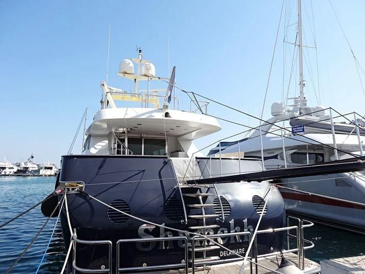 a boat docked at a pier aboard SHAMEKH Yacht for Sale