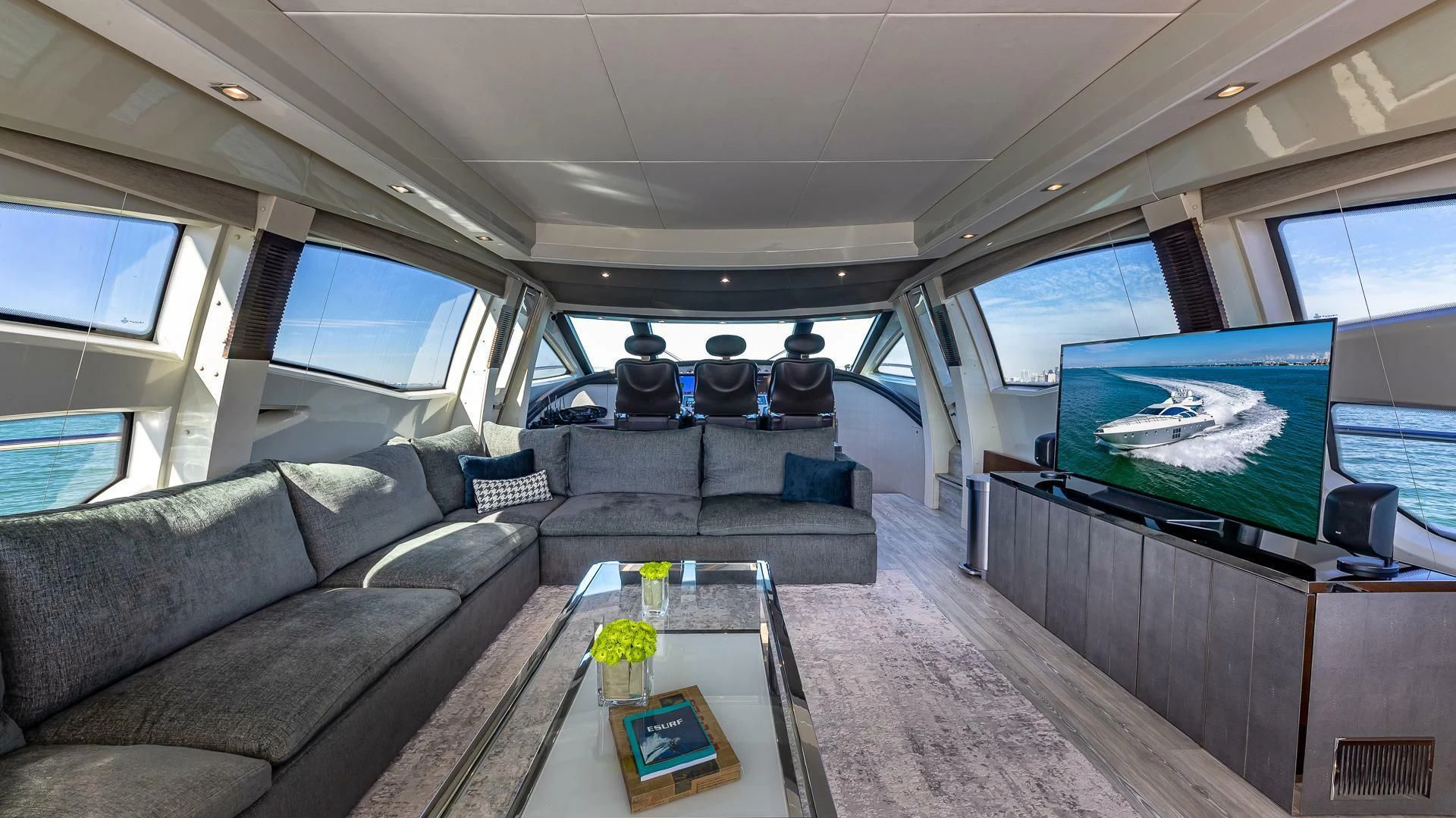 a large vehicle with a large screen aboard M Yacht for Charter