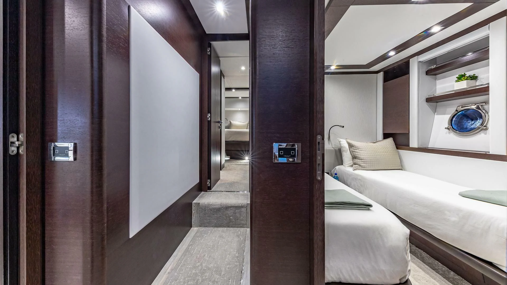 a room with a bed and a mirror aboard M Yacht for Charter