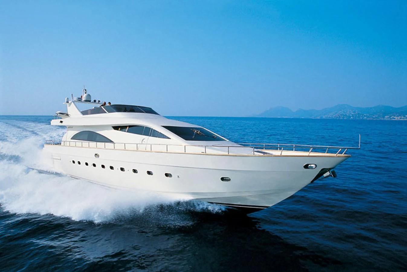 a white yacht on the water aboard M Yacht for Charter