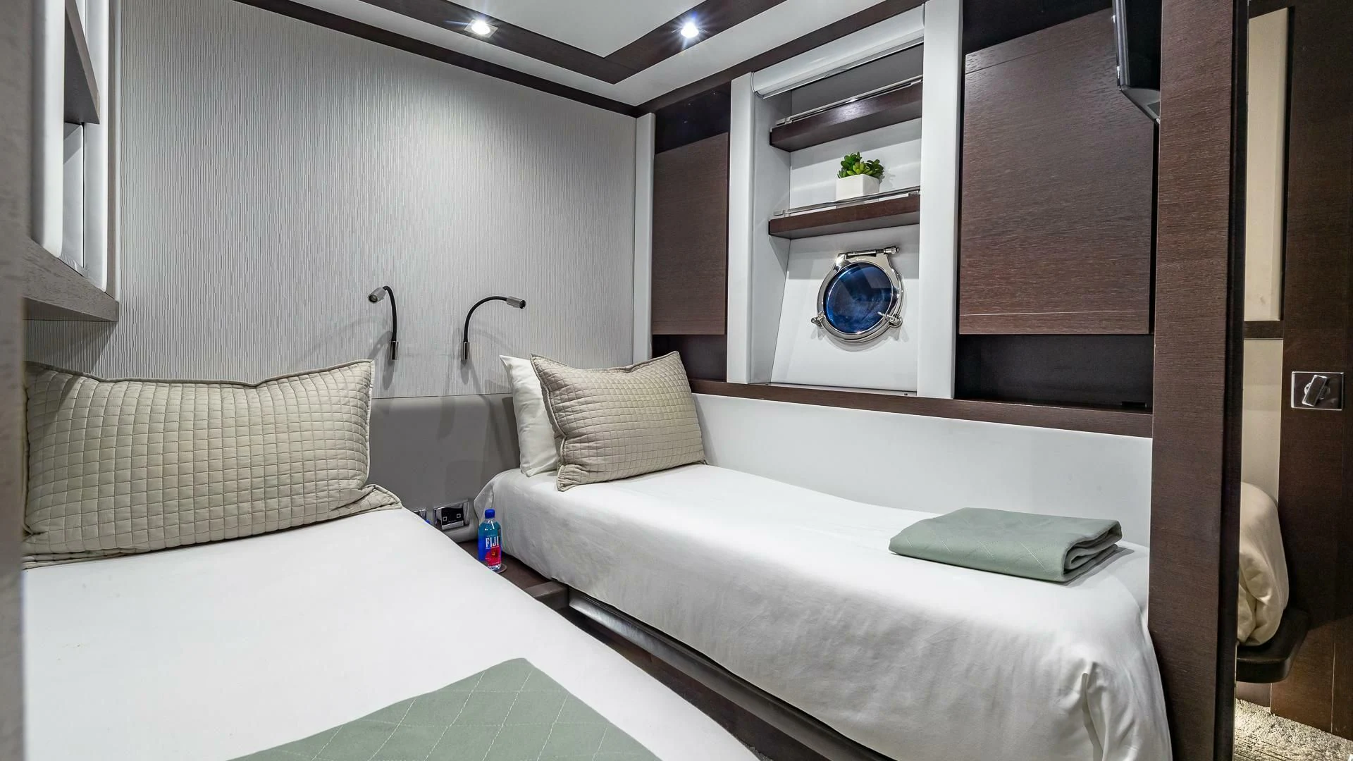 a room with two beds aboard M Yacht for Charter