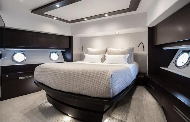 a bed in a room aboard M Yacht for Charter
